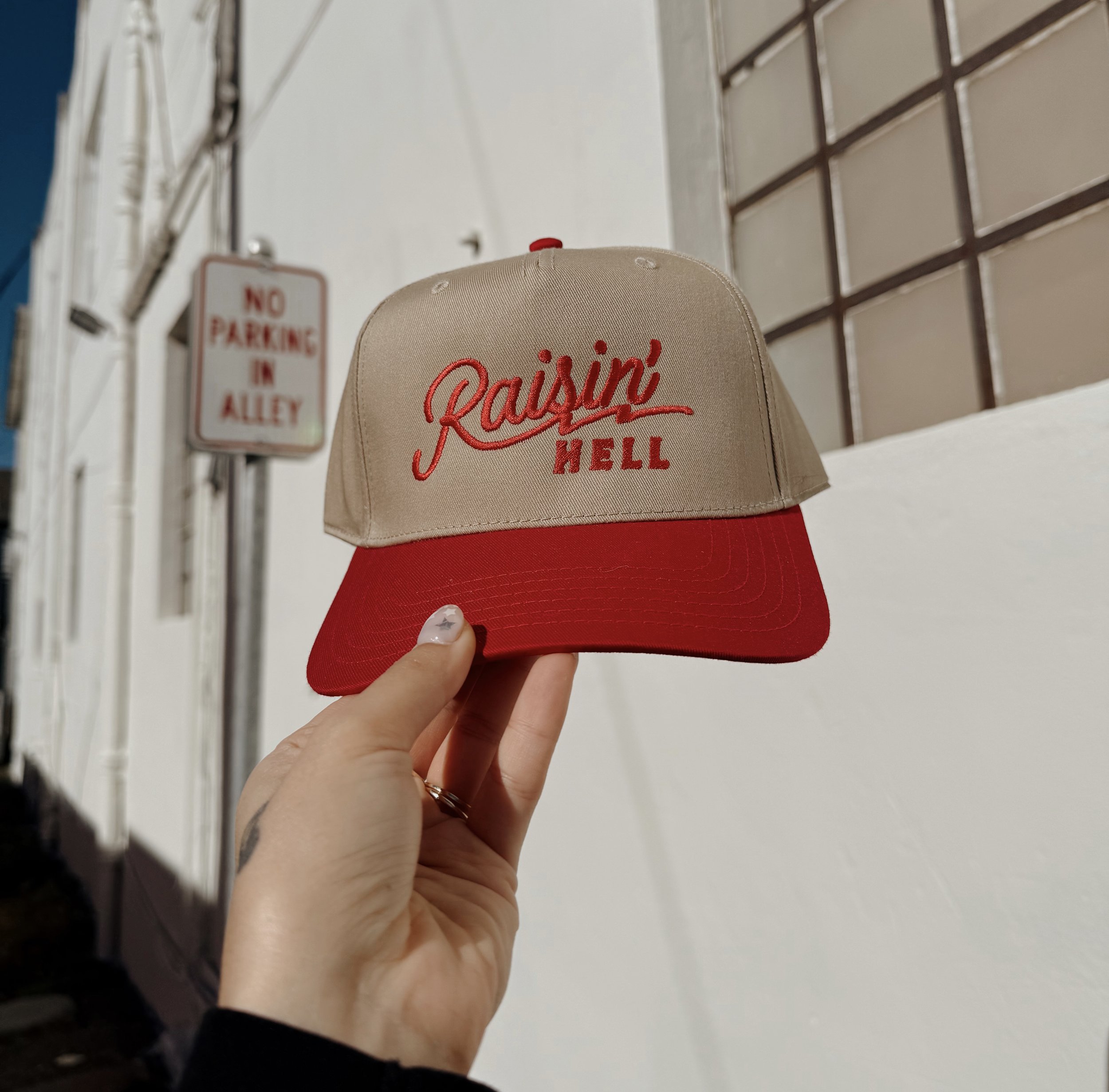 Raising Hell Trucker Hat
