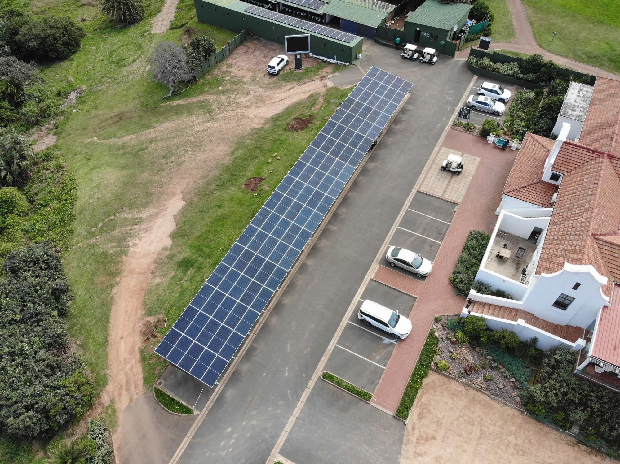 Golf Club, KZN – 74.4 kWp + 144 kWh
Carport solar canopy over the car park with a 100 kW Fox ESS hybrid inverter and 144 kWh of storage.