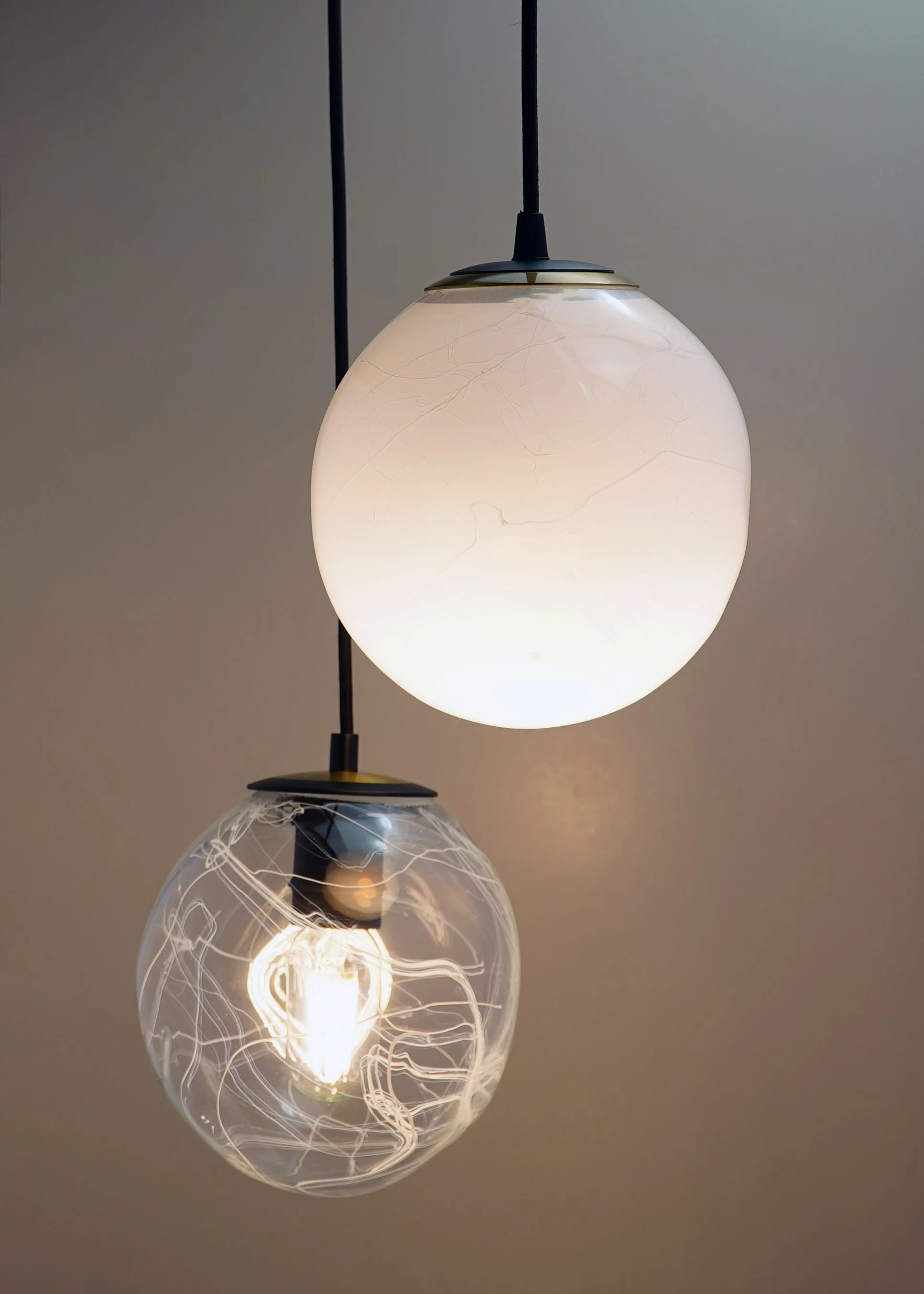 Silta captures the fine, natural lines of silt and stone. Hand-formed, each light tells a quiet story through its striated surface.
