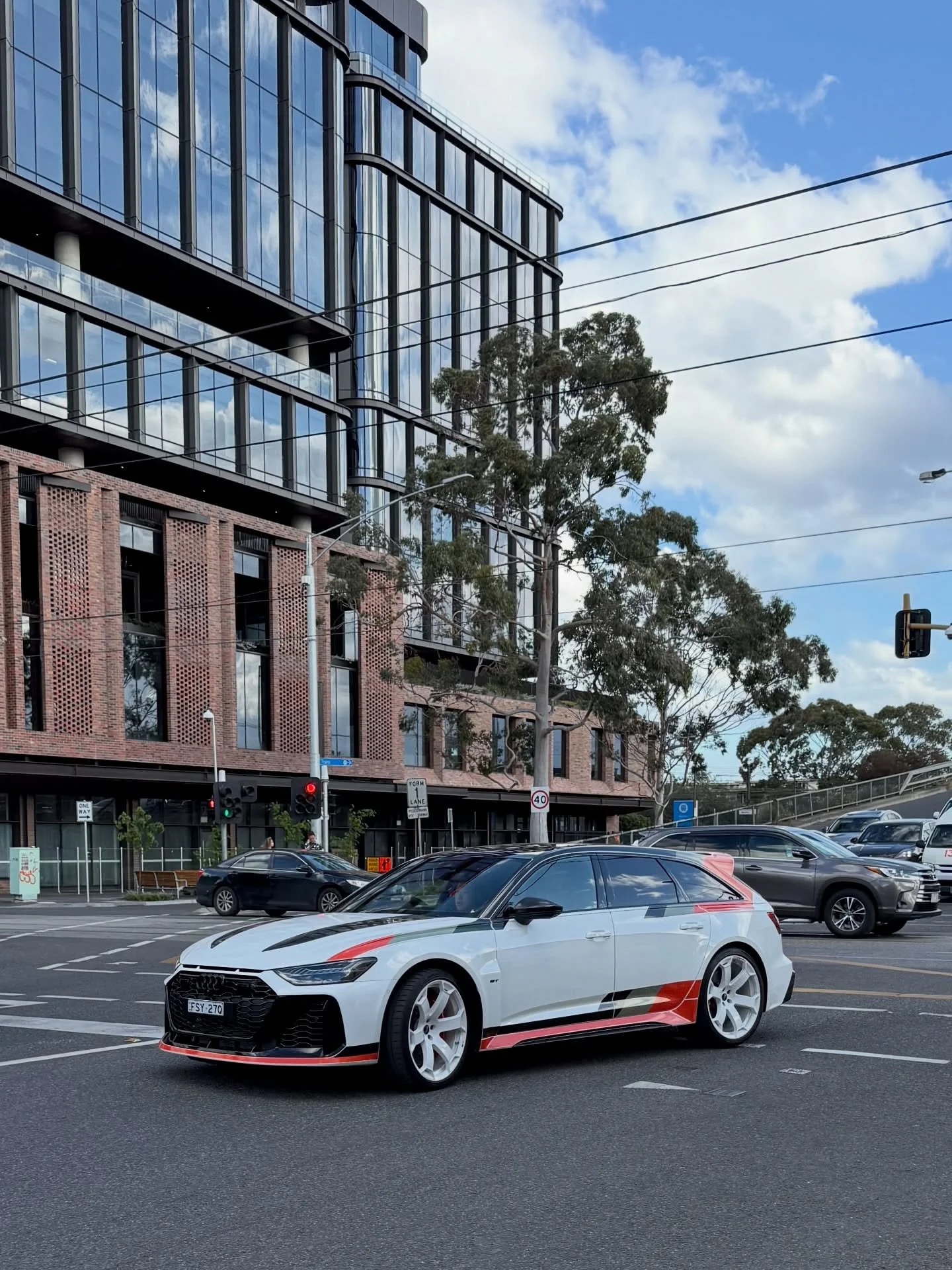 We&rsquo;ve seen a few of these getting around Melbourne now, but this is our debut feature.

This example also wears the race-inspired black, white, and red livery &mdash; fittingly the same palette splashed across the city today for the Melbourne M