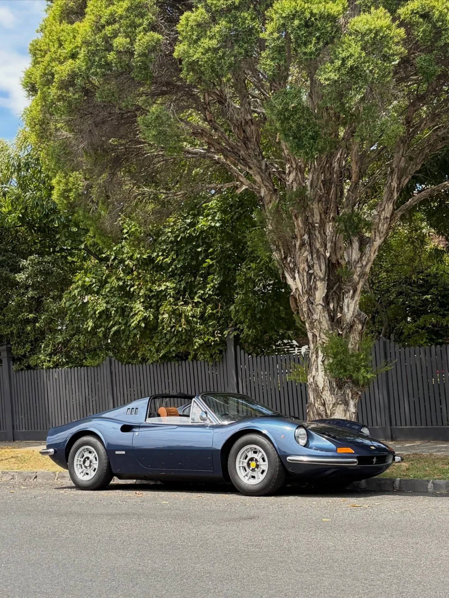 A breathtaking 1973 Dino 246 GTS spotted in Elsternwick, complete with its original W.H. Lowe sticker - the Melbourne-based importer responsible for bringing Ferraris into Australia before the marque had an official local distributor. 

Its Ferrari b