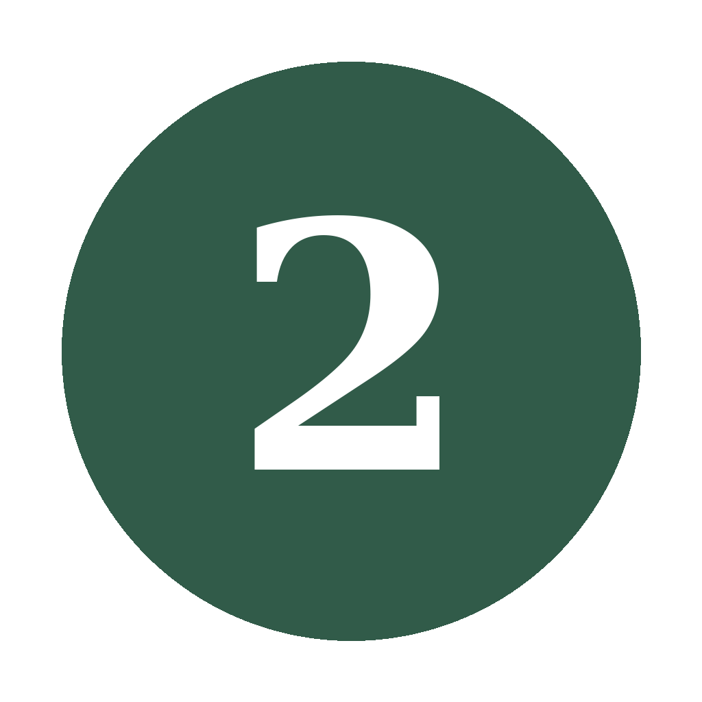 A green circular sign with the black number 2 in the center.