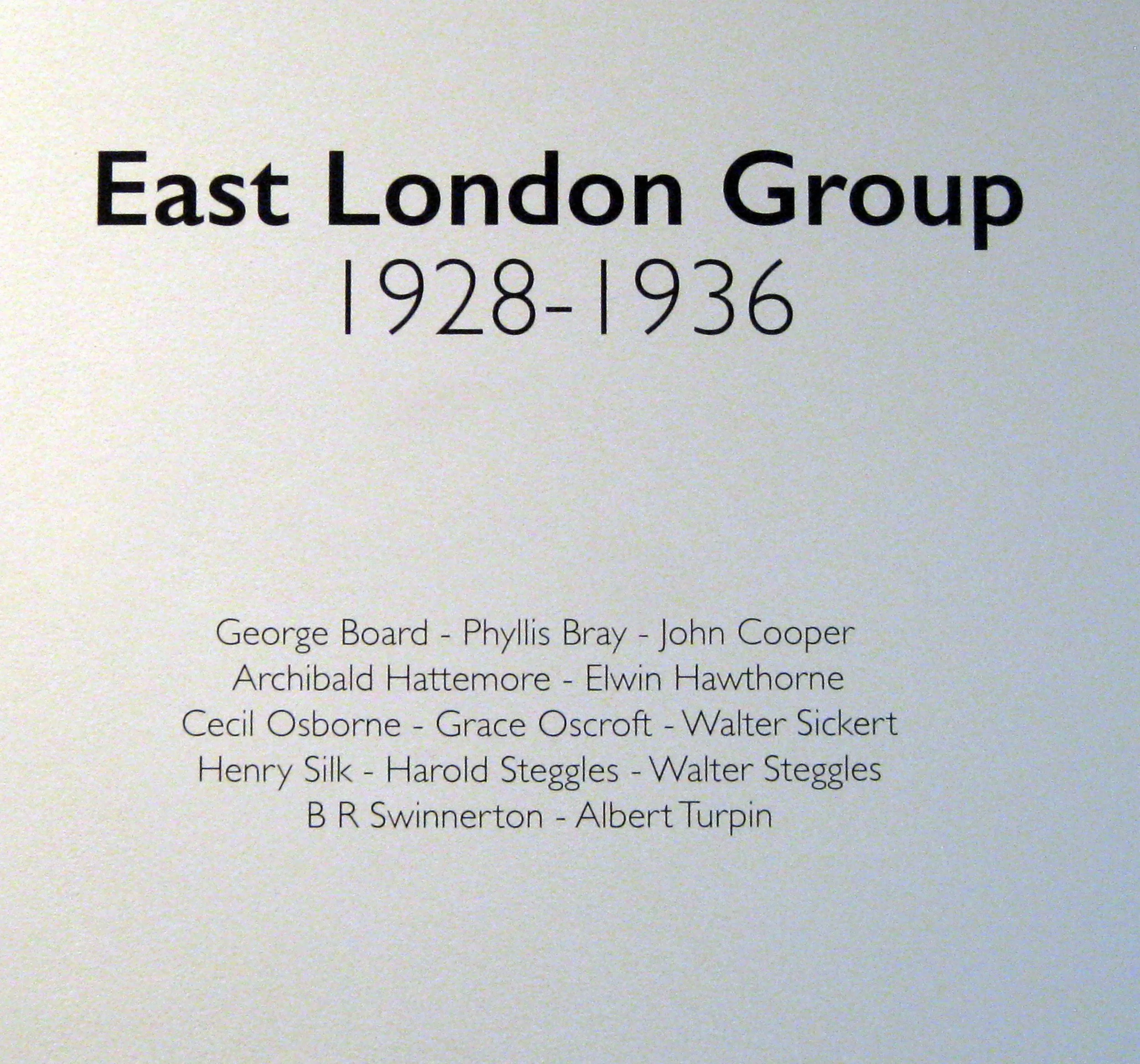 Title: East London Group 1928-1936, list of artist names include George Board, Phyllis Bray, John Cooper, Archibald Hattemore, Elwin Hawthorne, Cecil Osborne, Grace Oscroft, Walter Sickert, Henry Silk, Harold Steggles, Walter Steggles, B R Swinnerton, Albert Turpin.