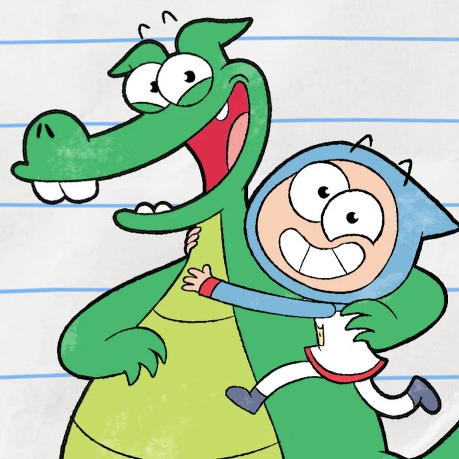 A cartoon green dragon is smiling and hugging a cartoon boy dressed in white with a blue hood. They appear to be drawn on white paper with blue lines running across it.