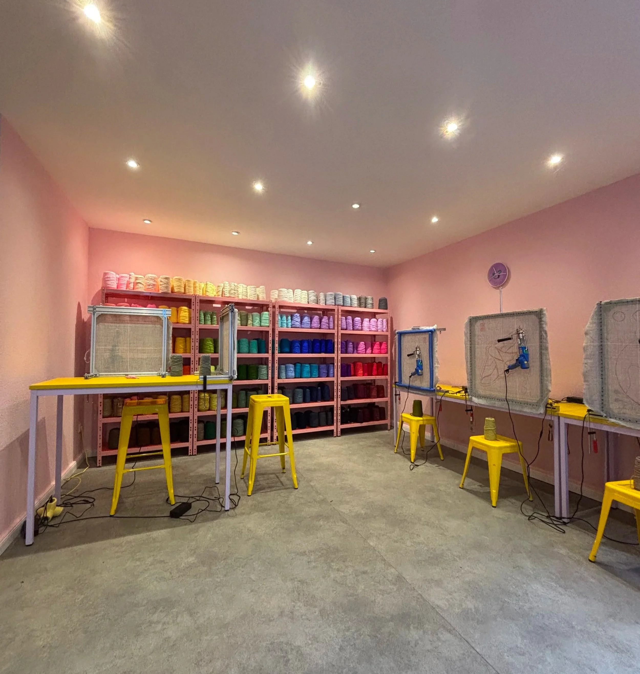 A colourful tufting studio featuring over 50 colours of yarn. Imagine a colourful studio perfect for team events and fun workshops