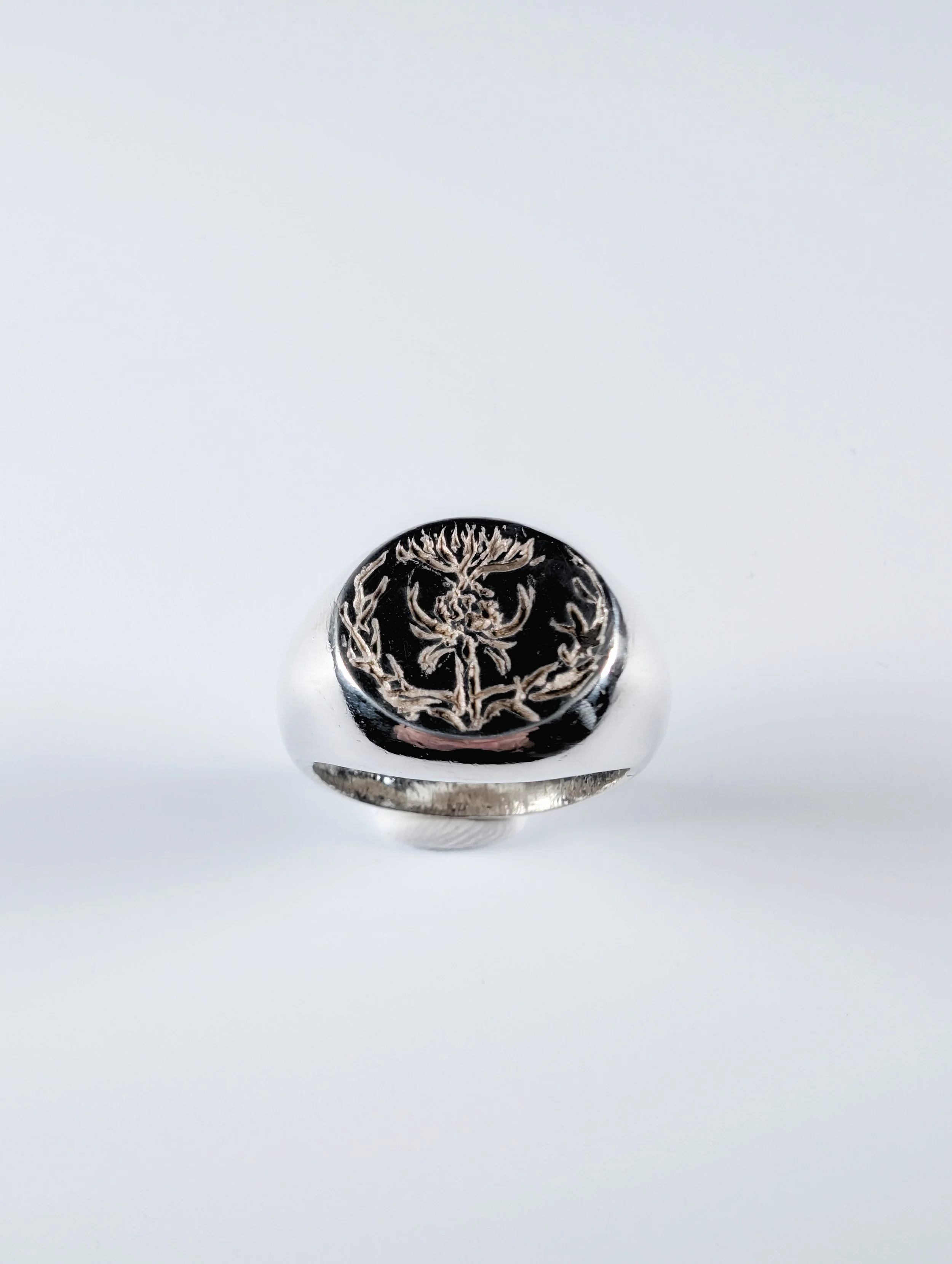 Sterling silver signet ring with a natural motif