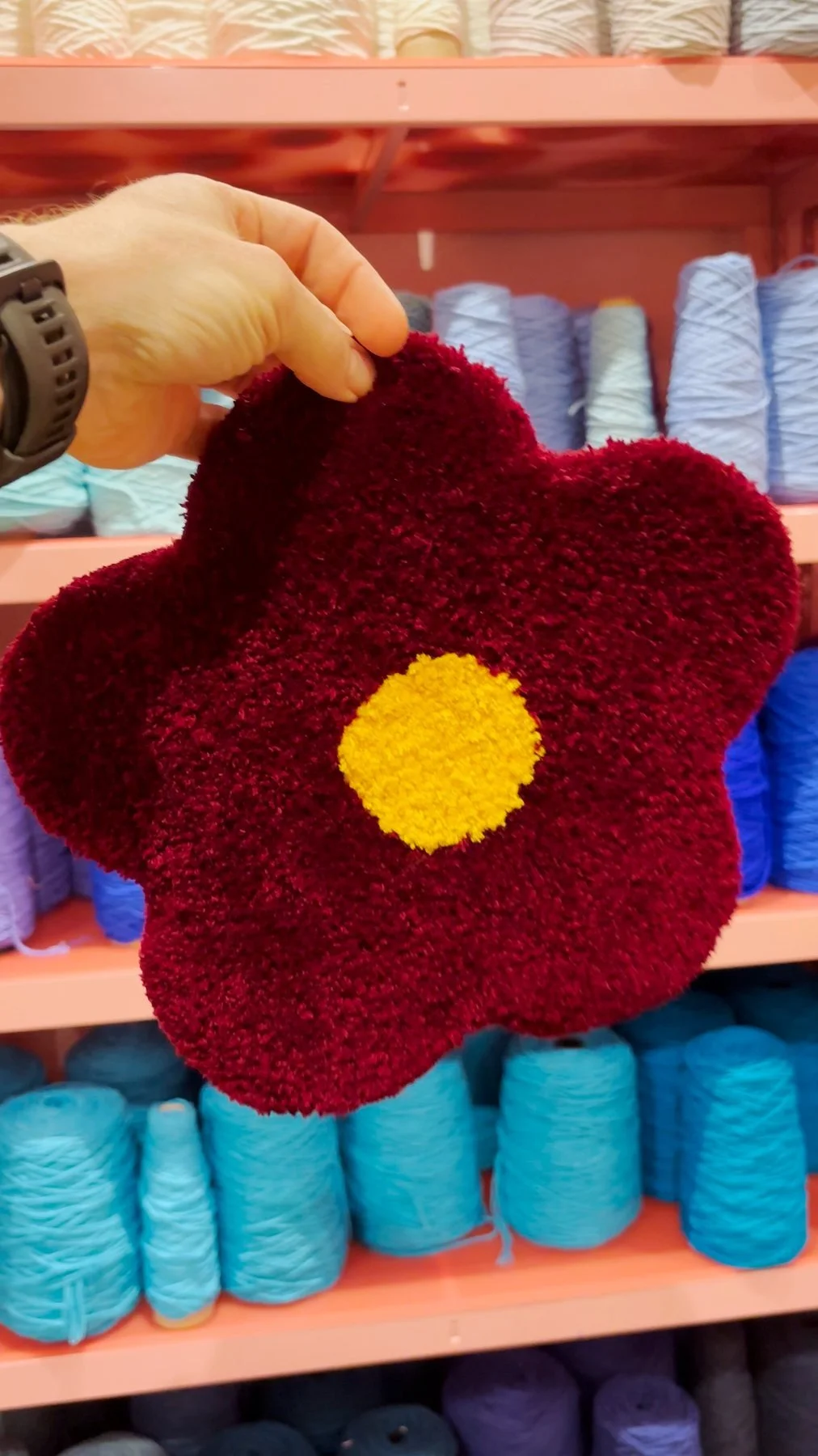 The Mini. A small tufted flower rug. 