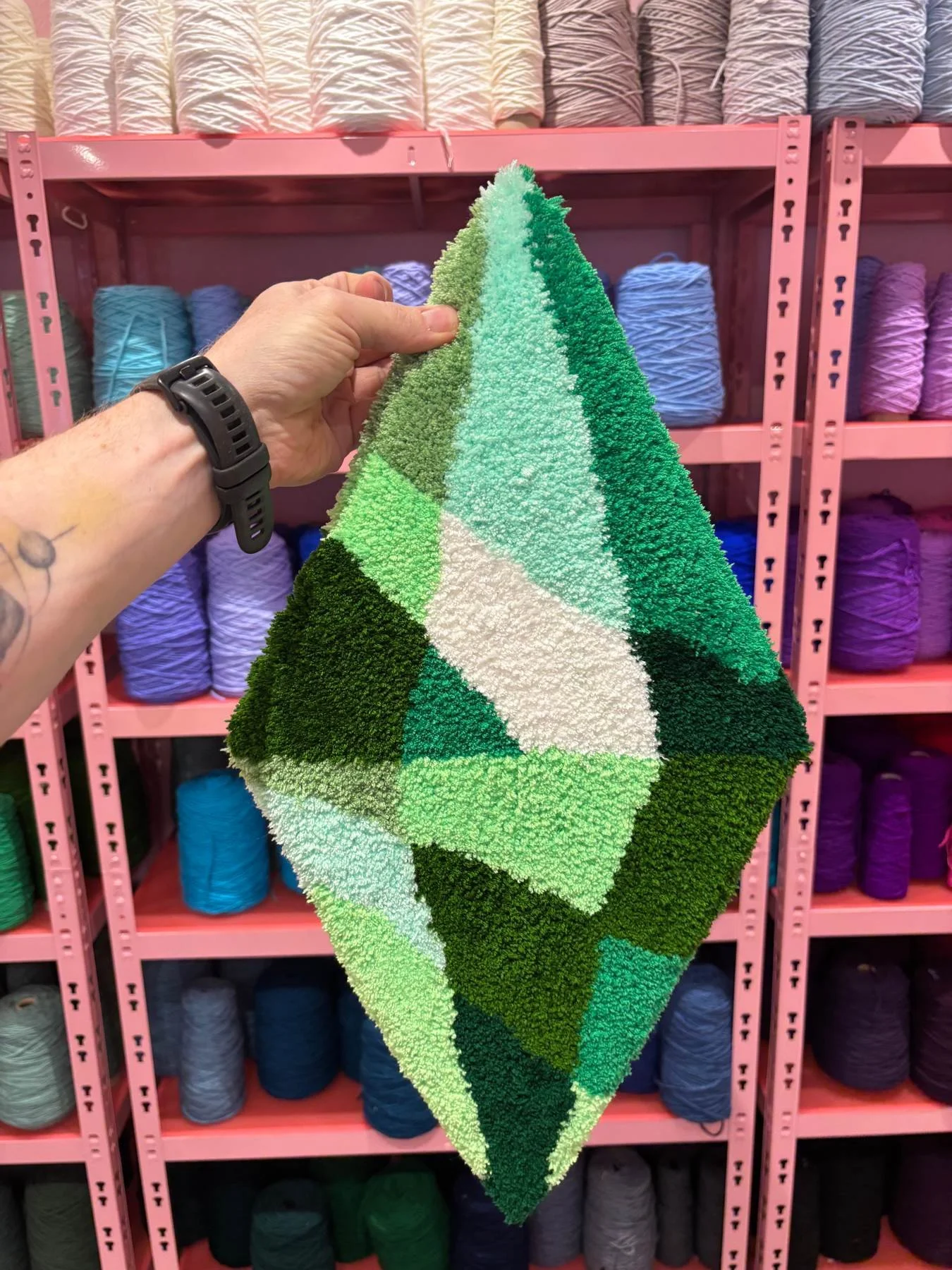 The OG. A green tufted gemstone rug