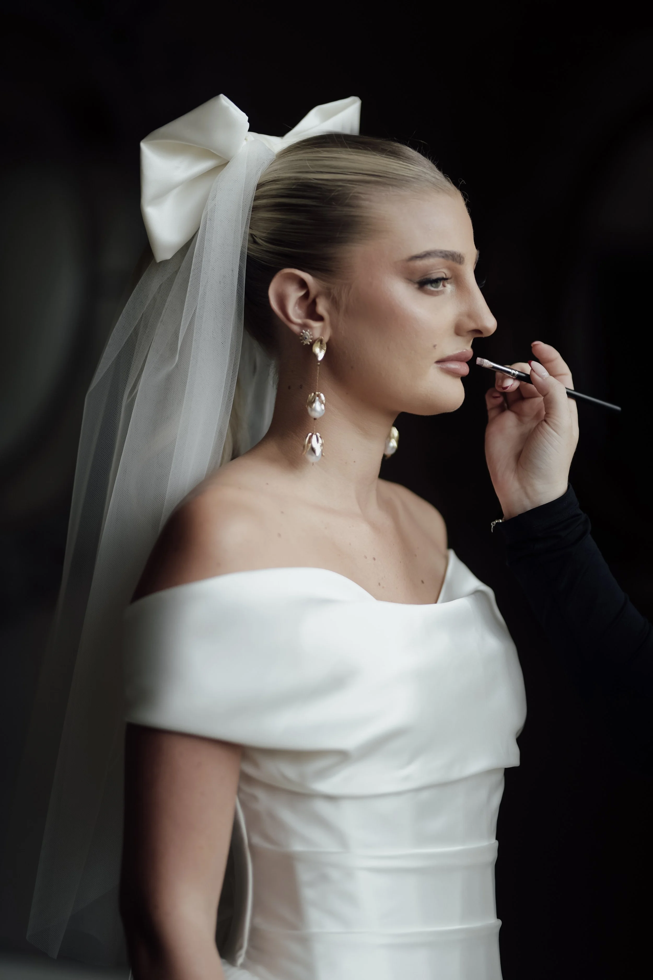 Bridal makeup application by Libby Addyman Makeup Artist during a luxury wedding morning, creating a timeless and radiant bridal look.