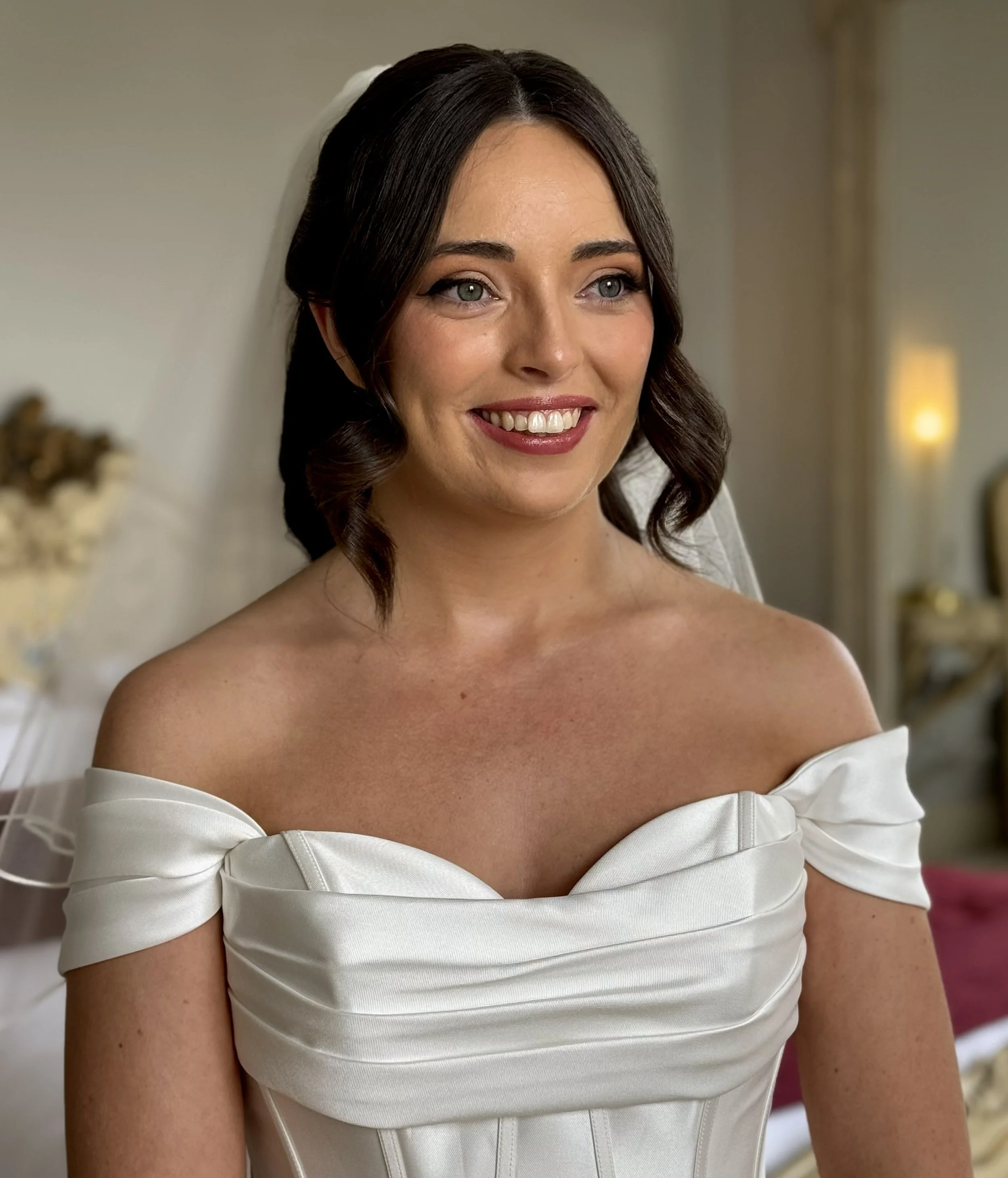 Luxury bridal makeup featuring glowing skin, soft definition and elegant wedding morning styling.