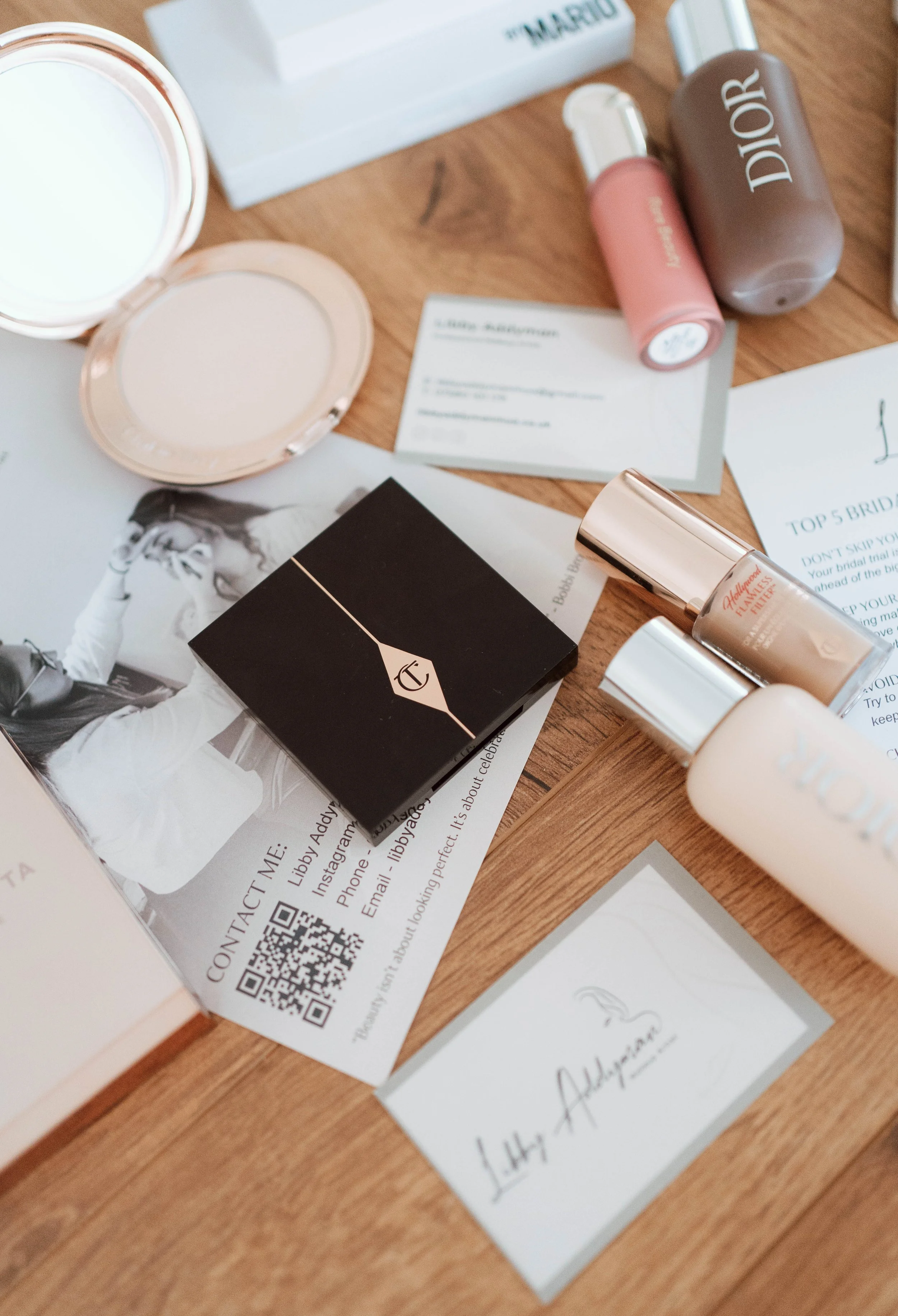 Luxury bridal beauty flat lay featuring professional makeup products, skincare and bridal beauty essentials.