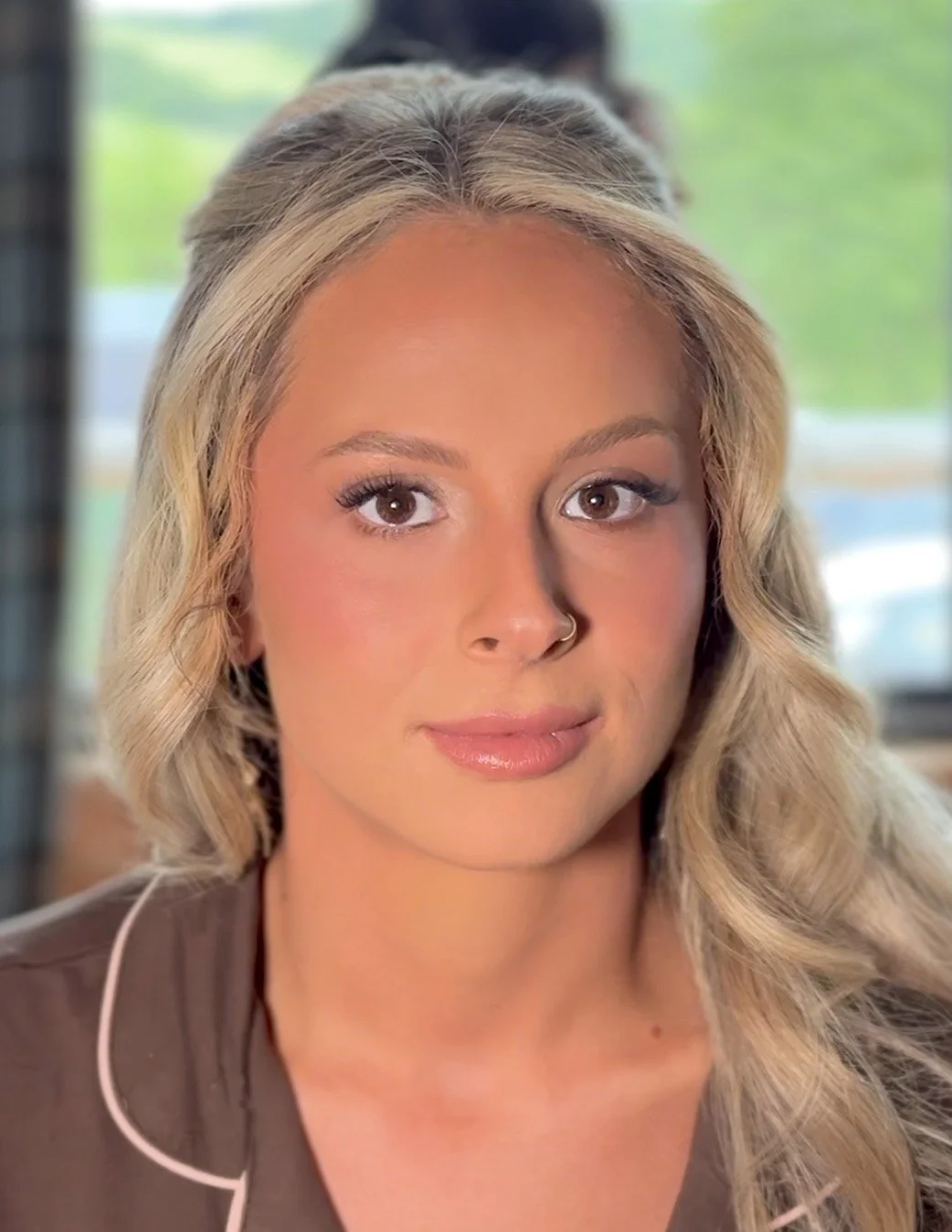 Soft bridal makeup close-up featuring flawless skin and natural wedding beauty.