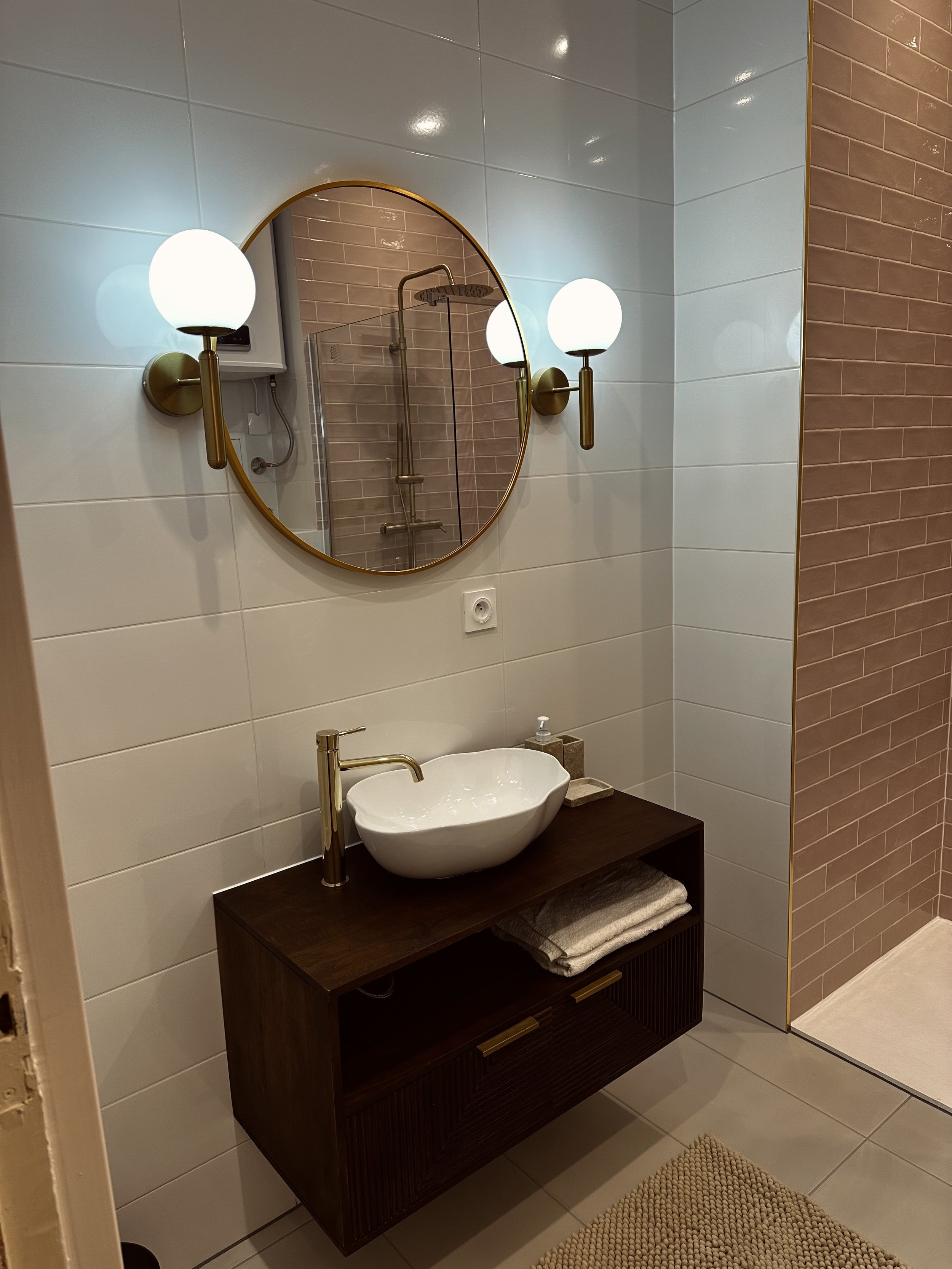     project-miramar-bathroom-vanity-brass-mirror.jpeg