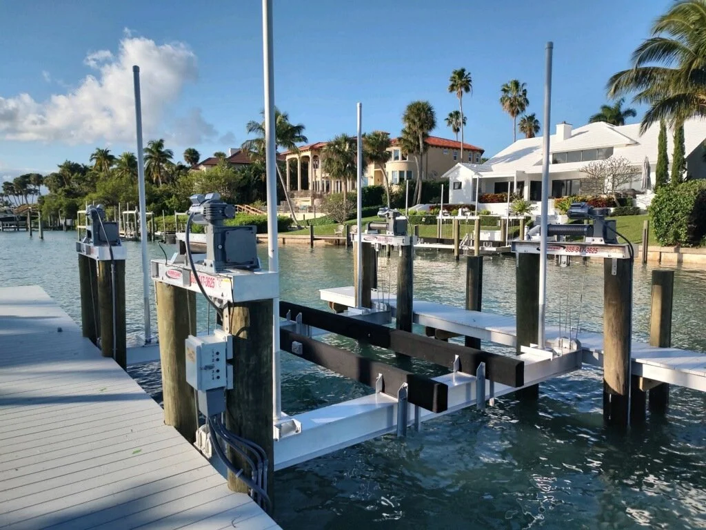 Boat lift at a South Florida waterfront home prepared for hurricane season and severe weather protection.