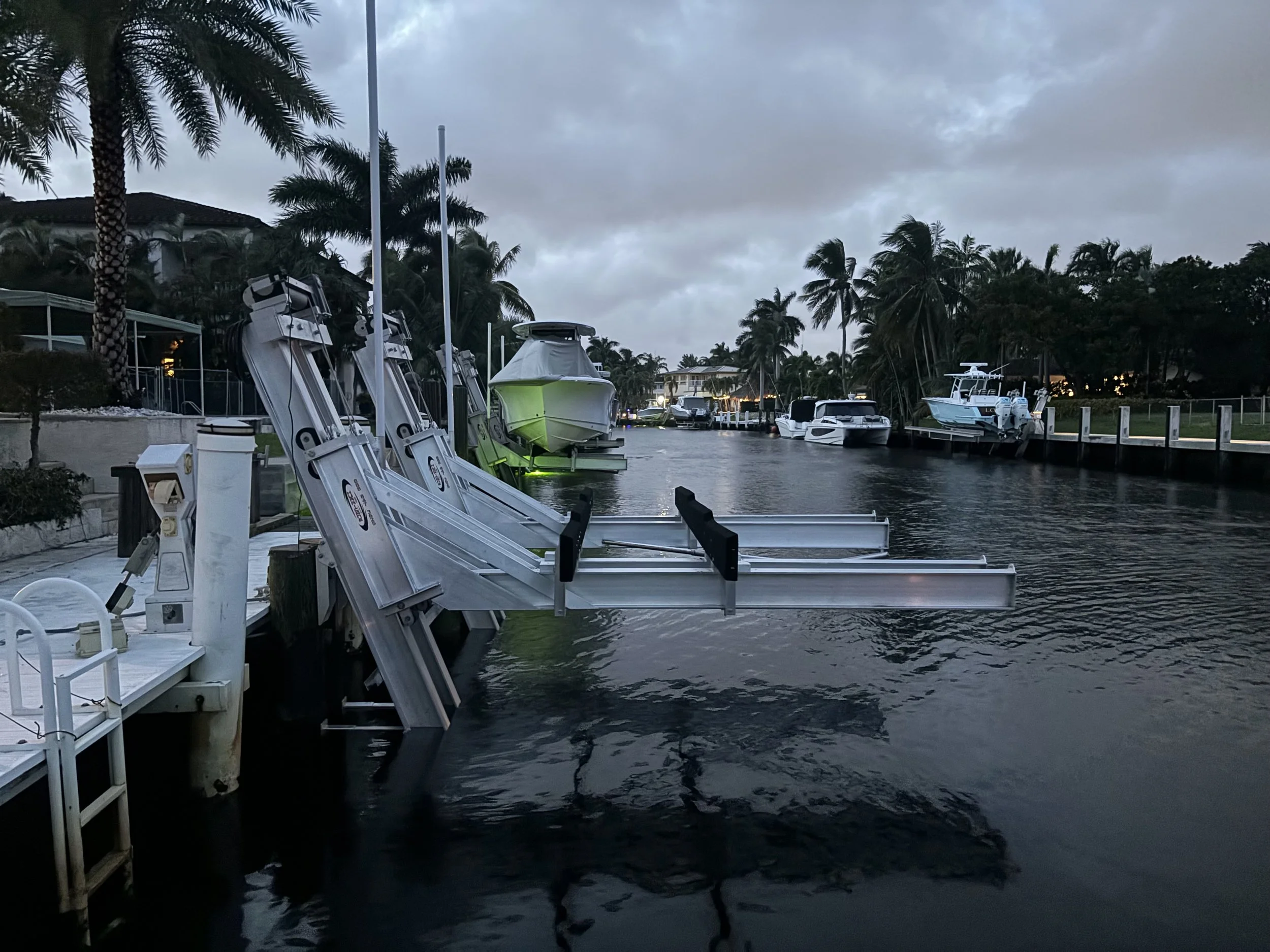 Boat lift installation project completed by JKT Marine in Pompano Beach, Florida waterfront properties.