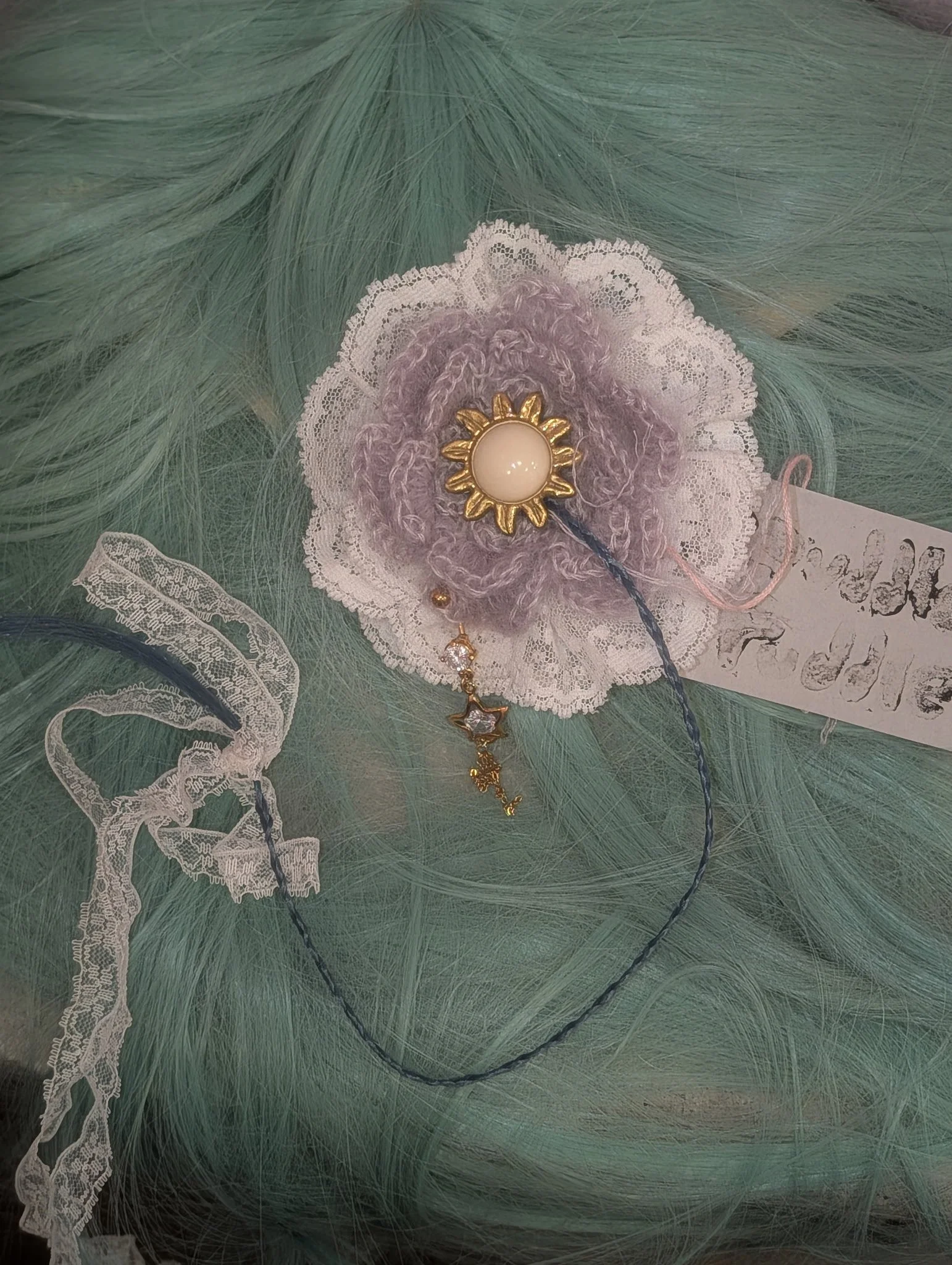 Cuddle Puddle icy flower brooch