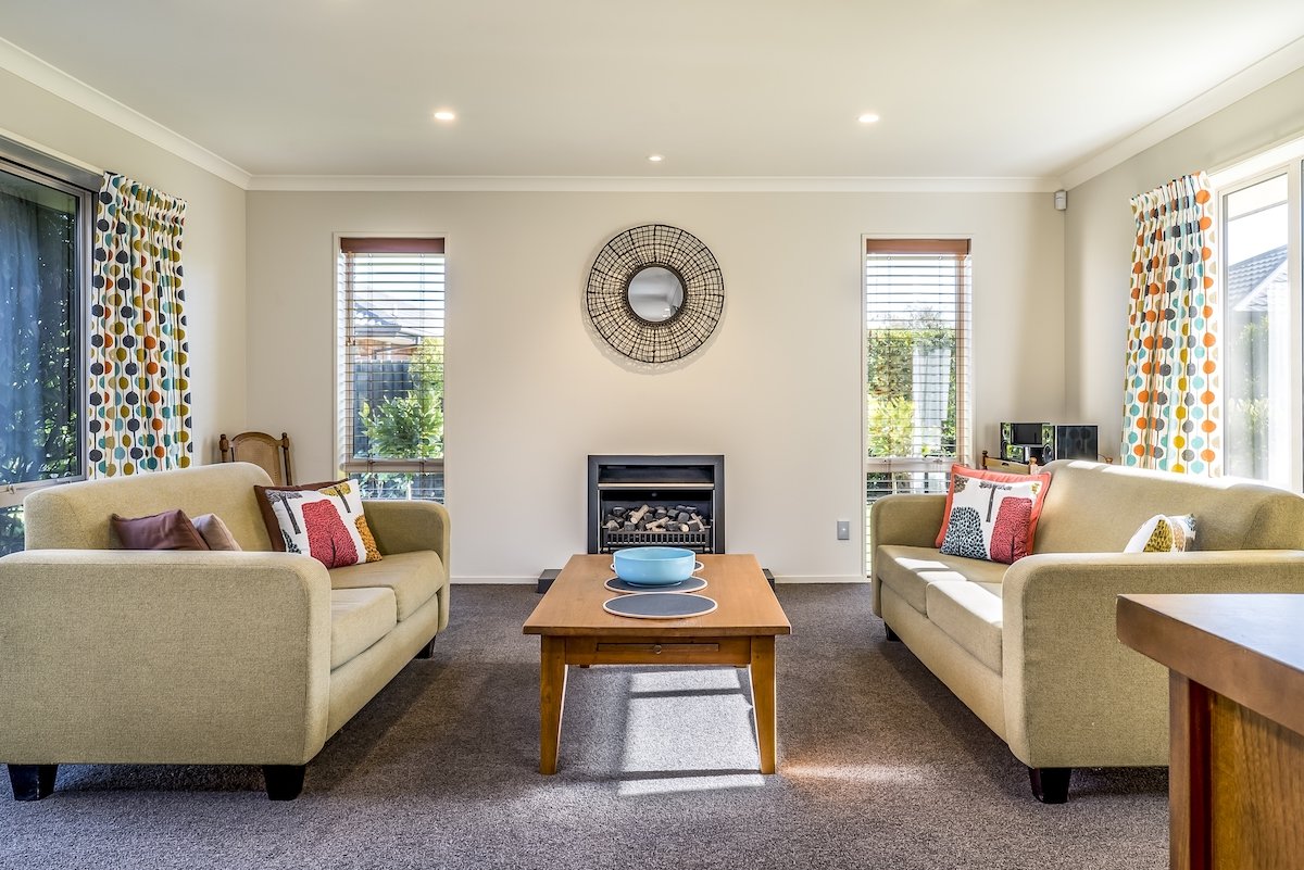 living-room-modern-apartment-with-two-identical-sofas-opposite-each-other.jpeg