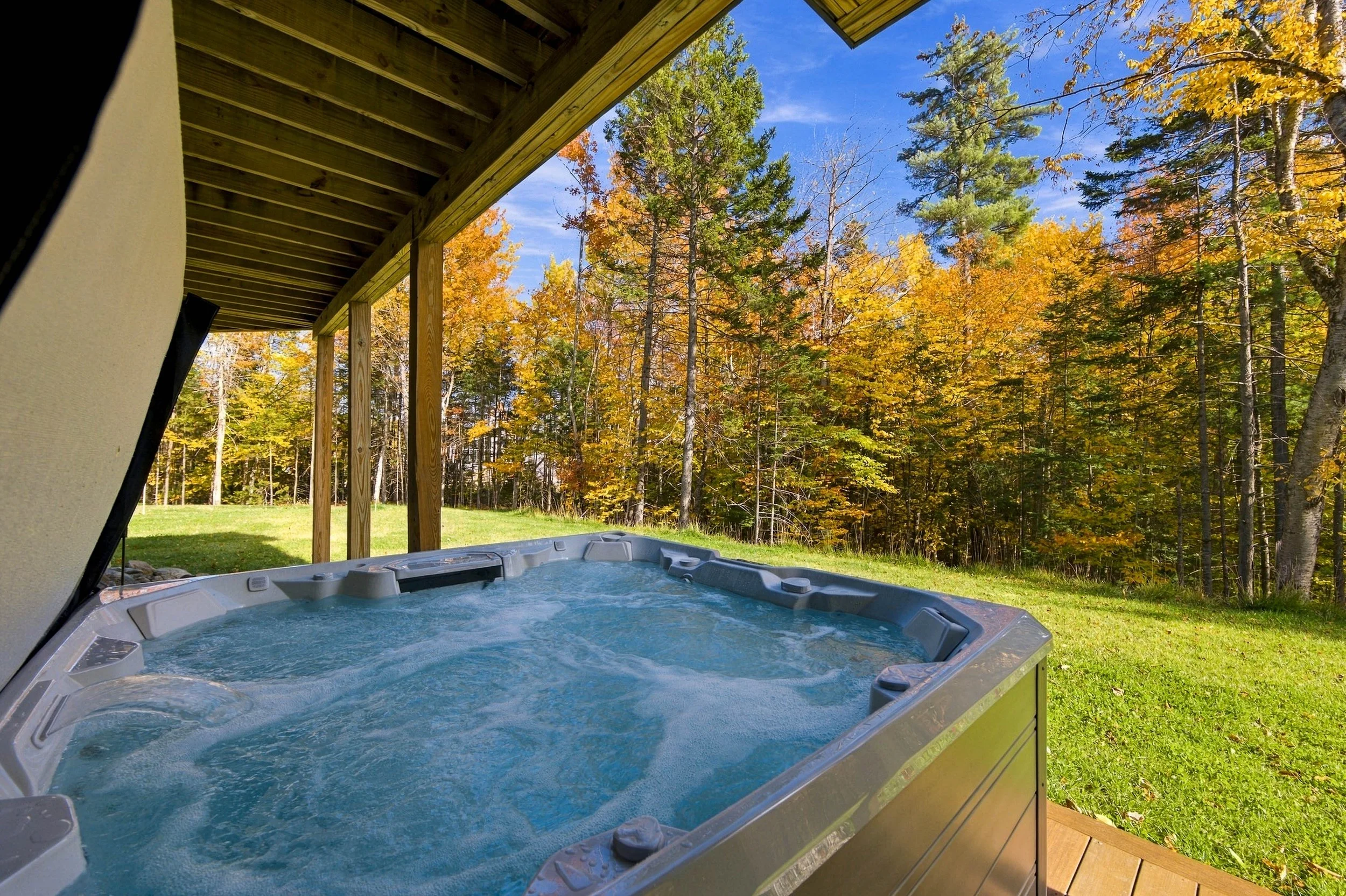 Sink into your private hot tub and unwind while surrounded by the peaceful beauty of the Maine woods.