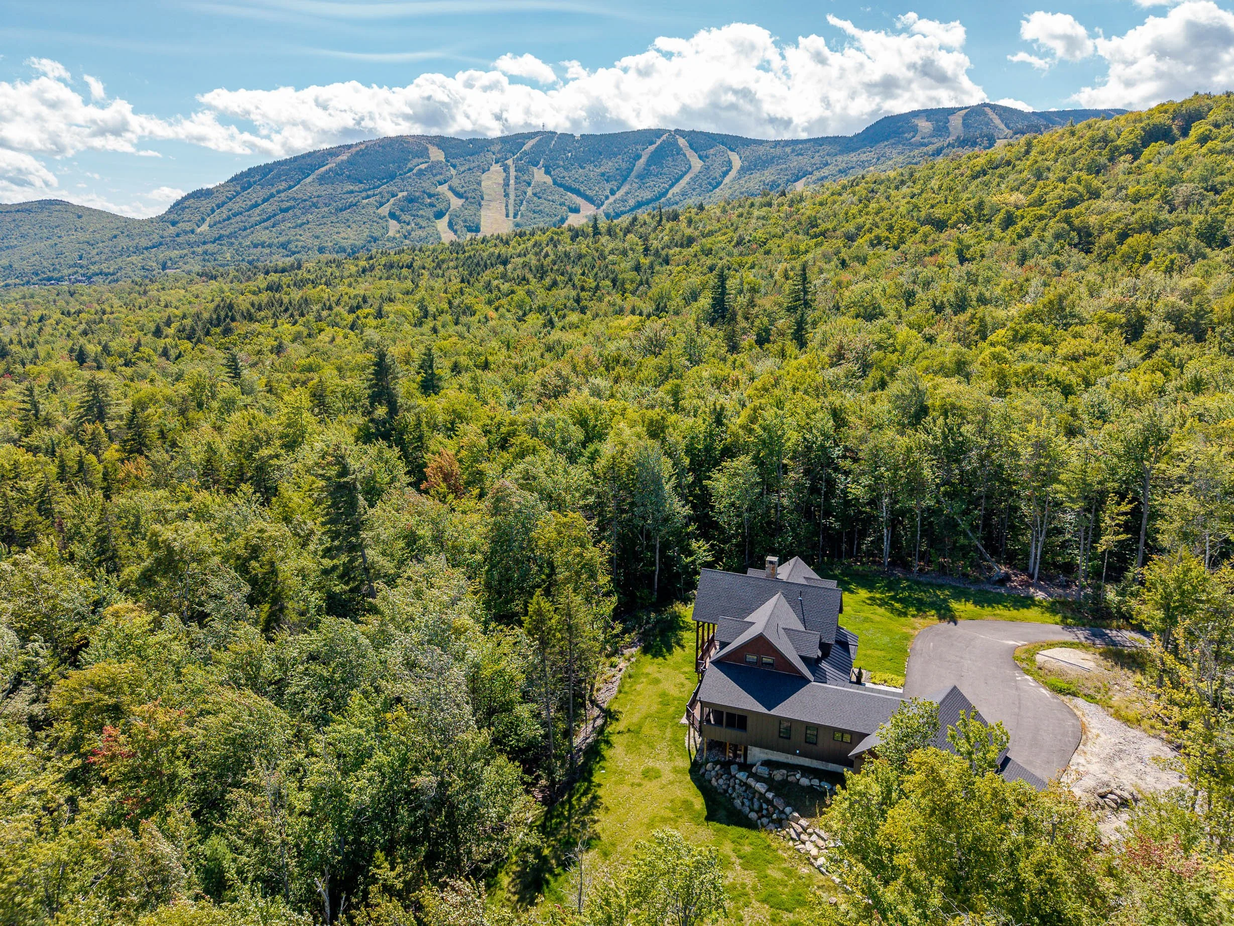 Nestled among the trees near Sunday River, Morganite Estate offers a private mountain escape surrounded by Maine's natural beauty.