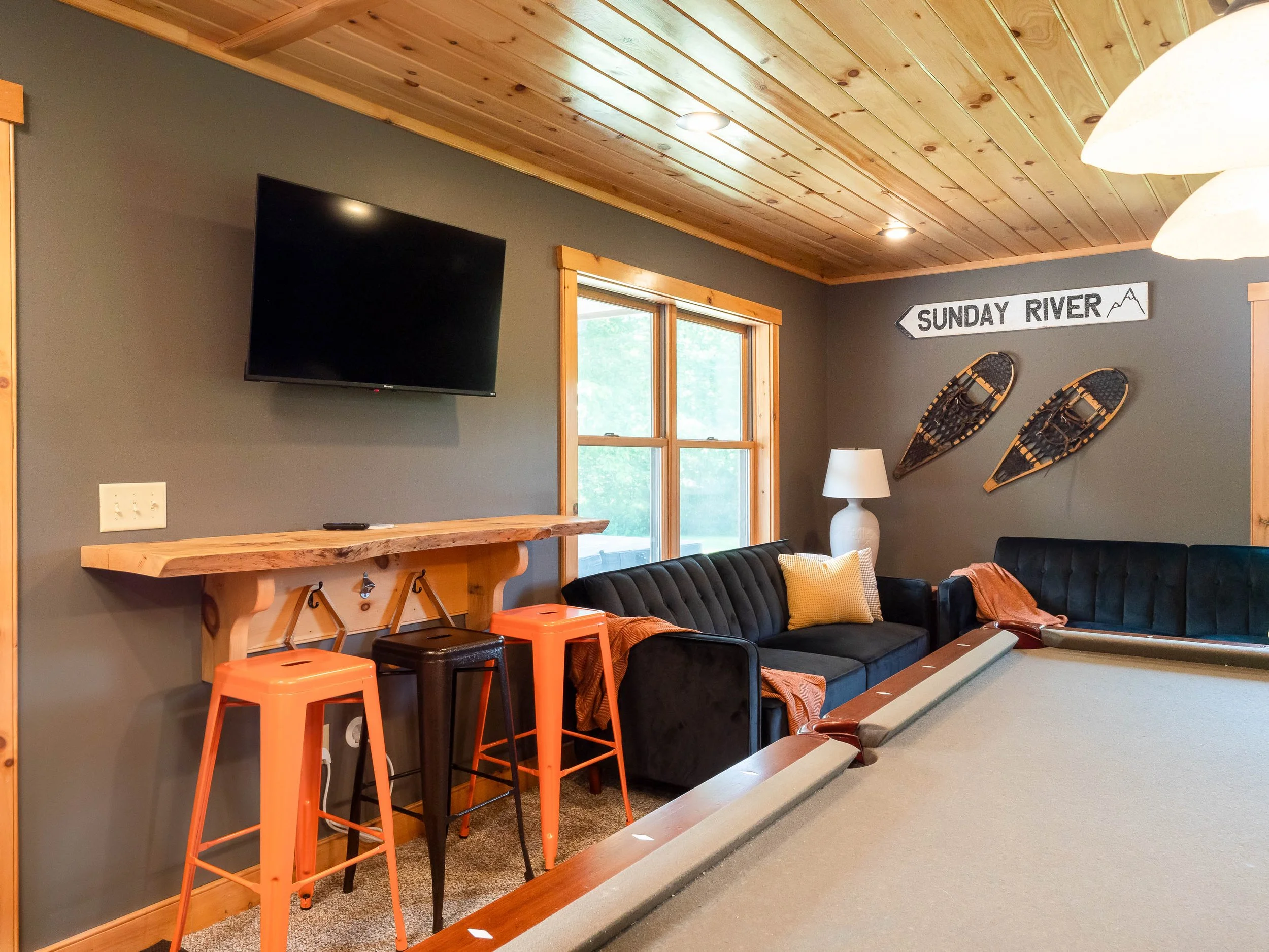 Spacious game room at The Lone Star at Sunday River mountain home in close to Sunday River Resort minutes from the slopes with two HDTVs