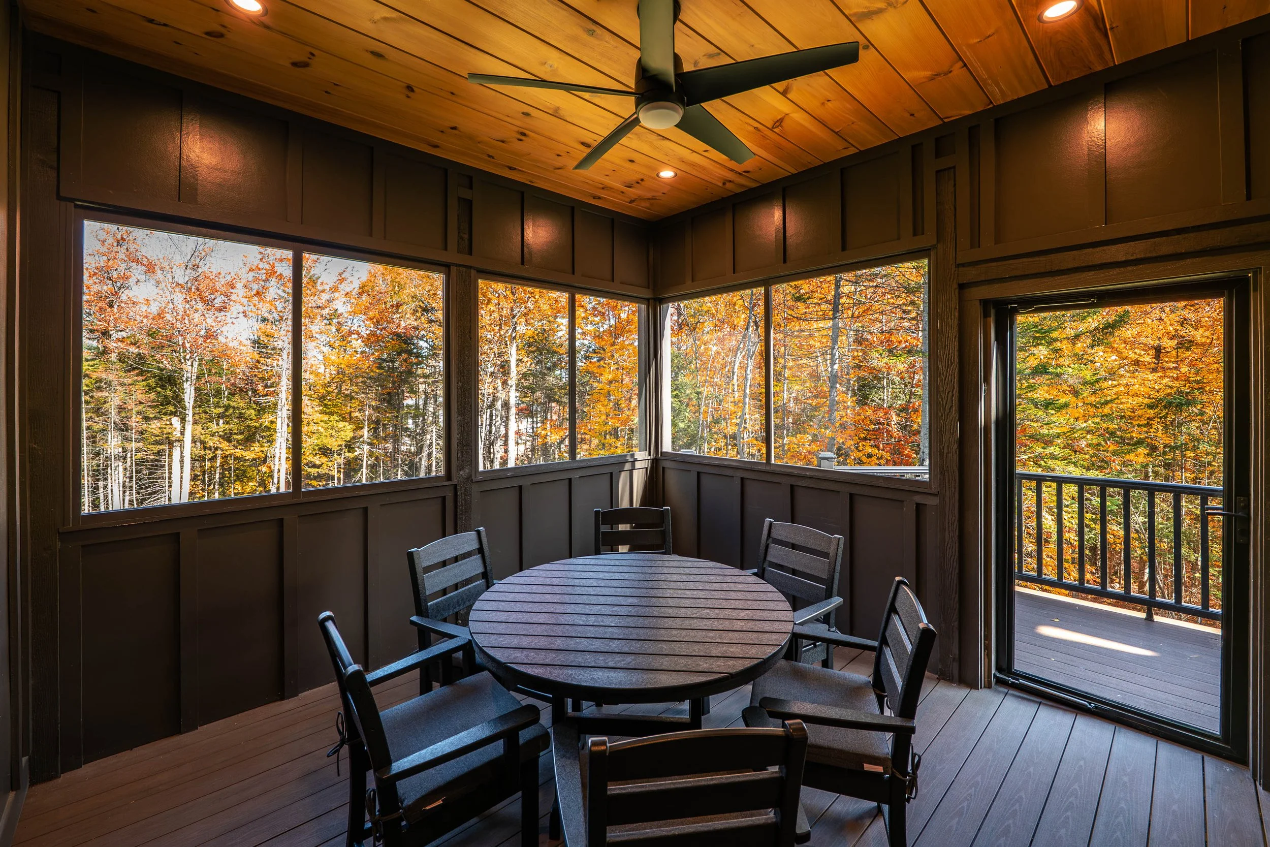 Dine outdoors in the beautiful screened porch, where fresh mountain air and forest views make every meal memorable.