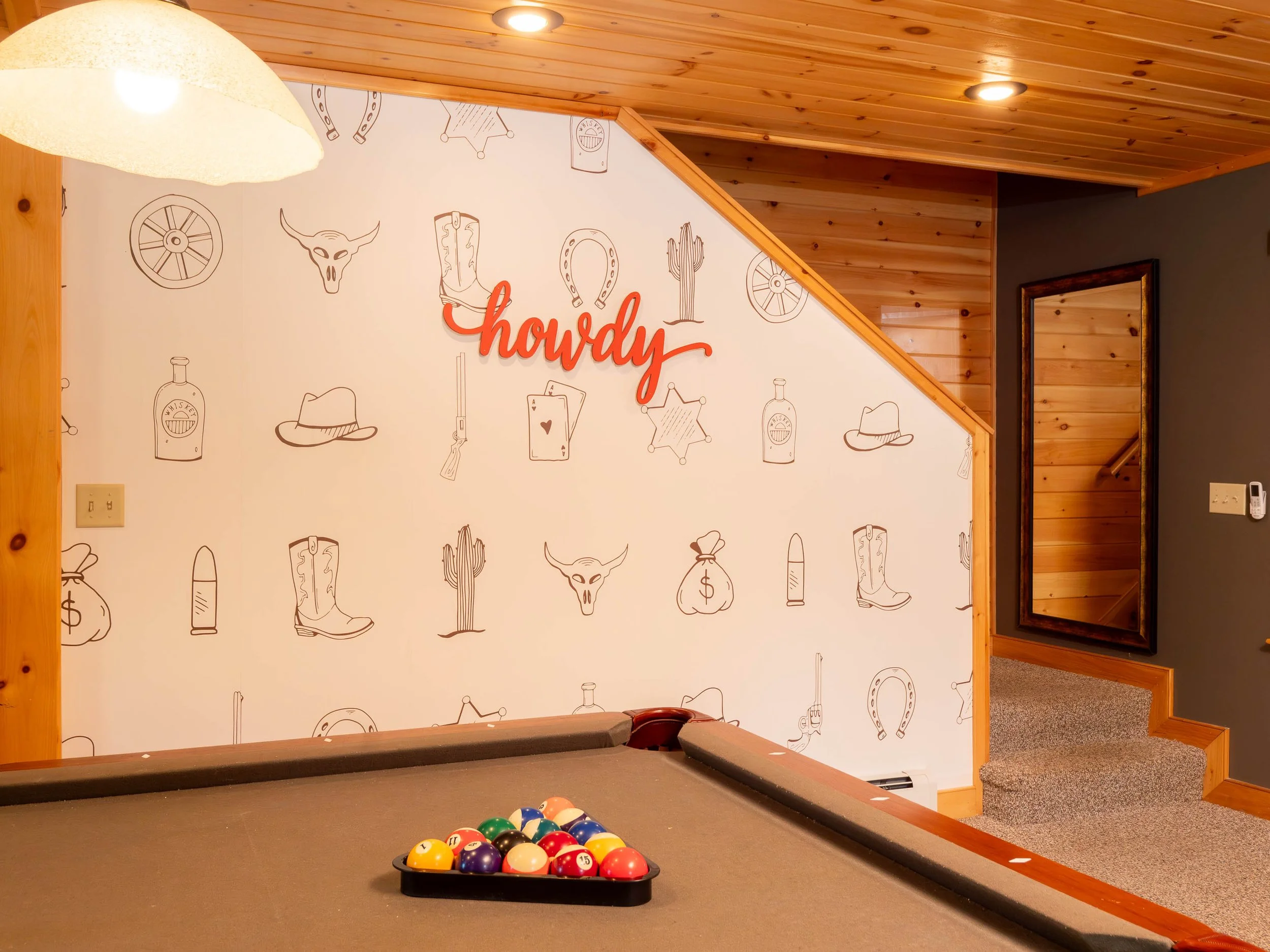 Stylish game room at The Lone Star at Sunday River family getaway in close to Sunday River Resort in the Western Maine mountains for family fun with pool table