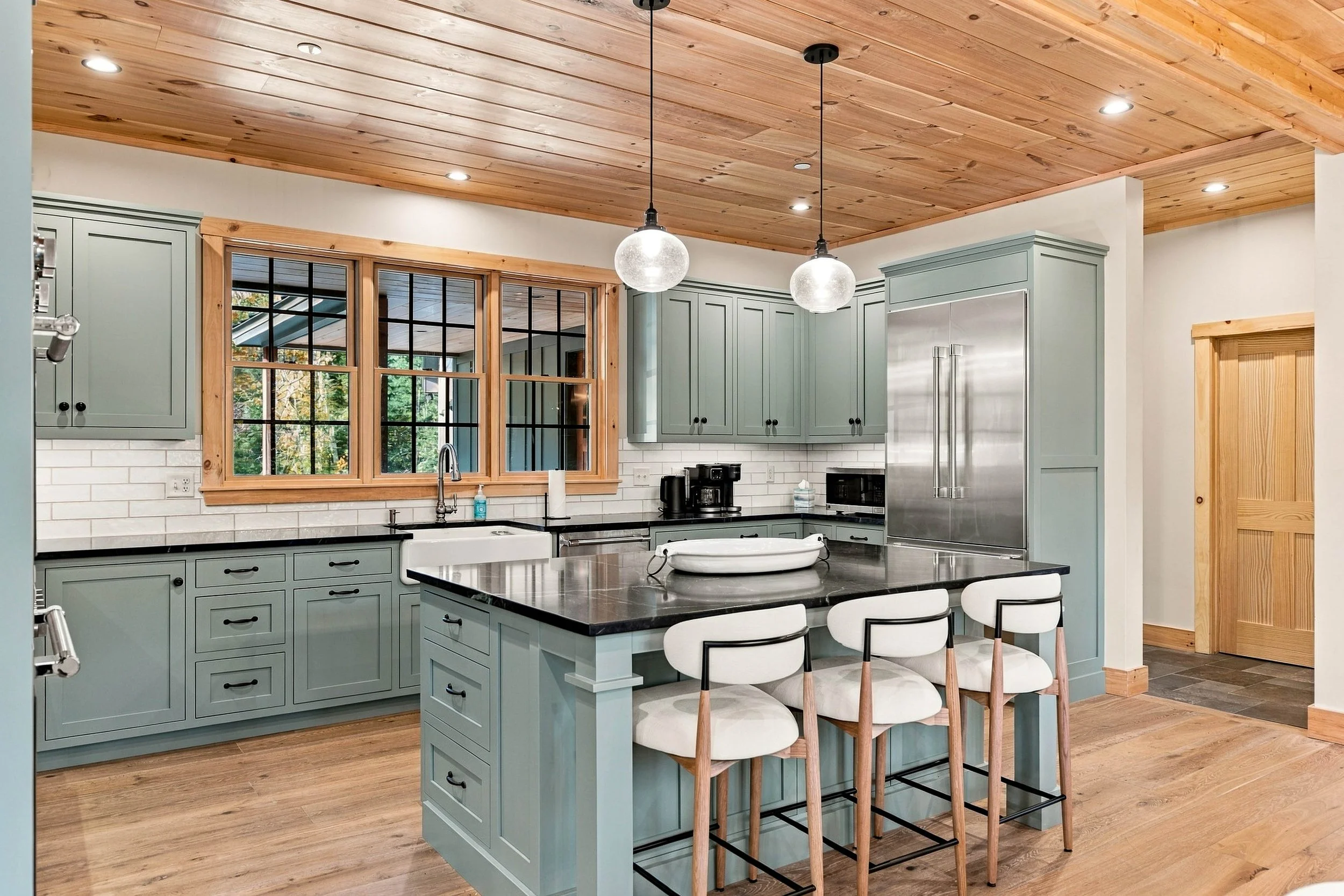 Premium appliances, elegant finishes, and a spacious island make this gourmet kitchen a dream for cooking and entertaining.