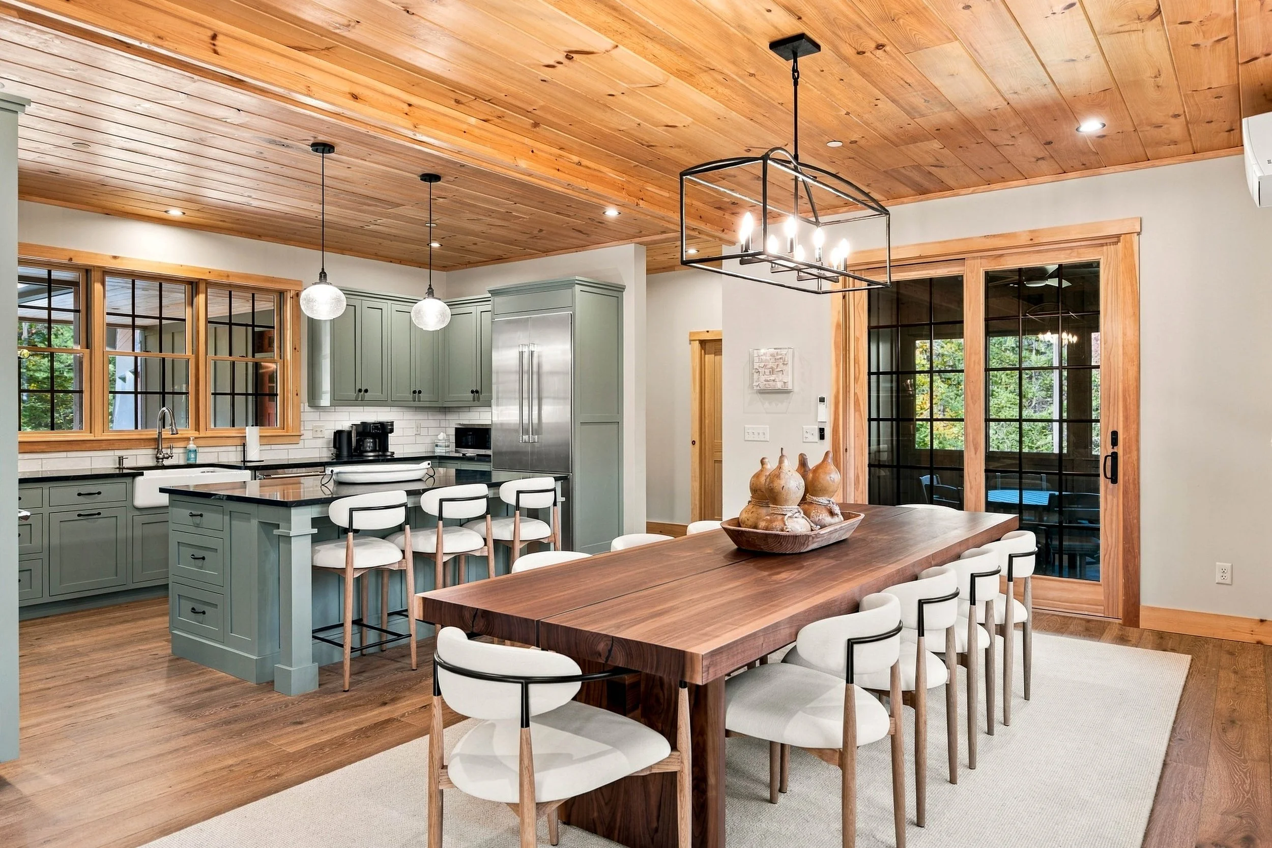 The open-concept kitchen and dining area makes hosting family dinners and group getaways effortless.