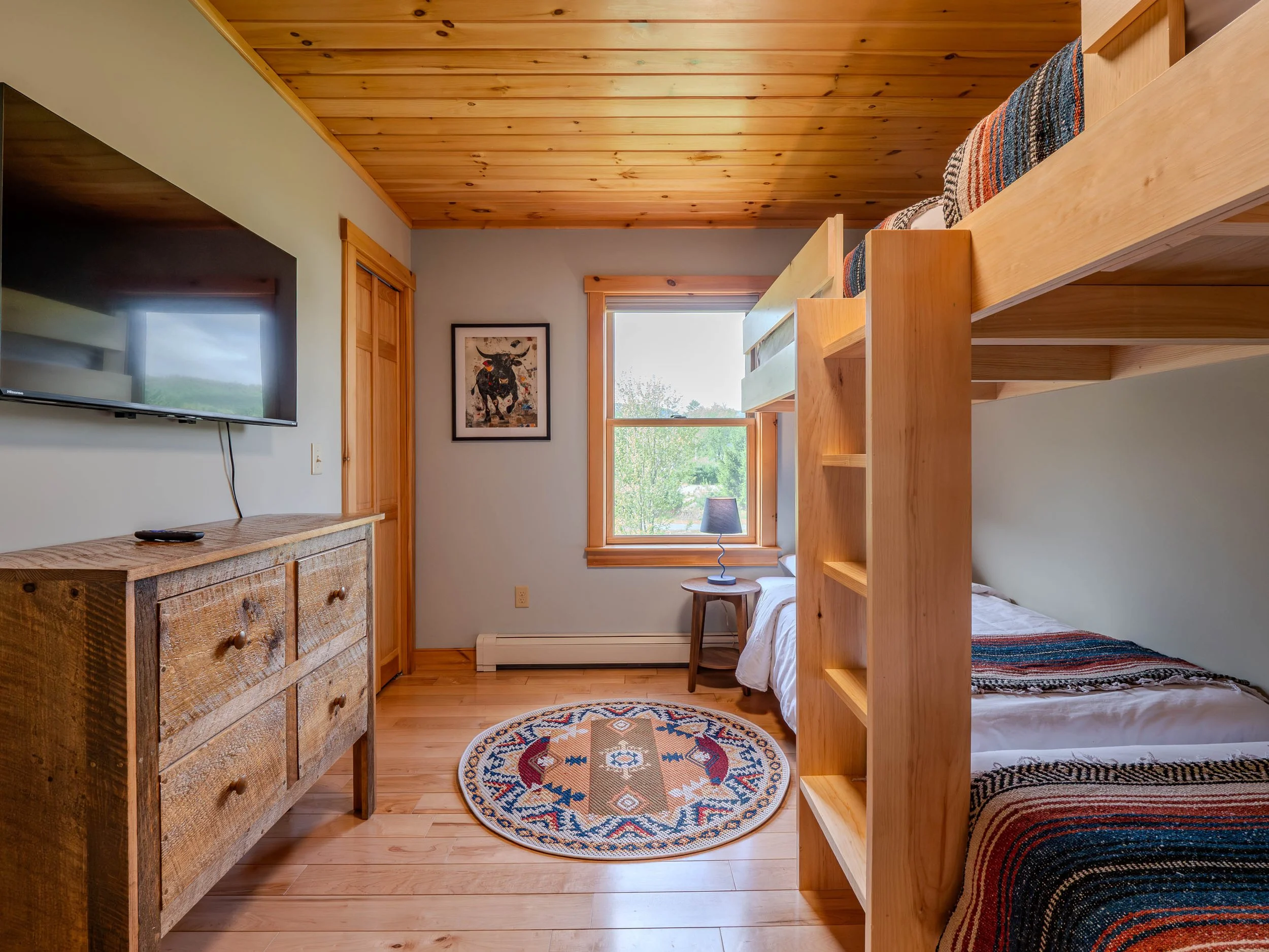 Family-friendly bunk bedroom at The Lone Star at Sunday River mountain retreat in Sunday River area minutes from the slopes with family-friendly layout
