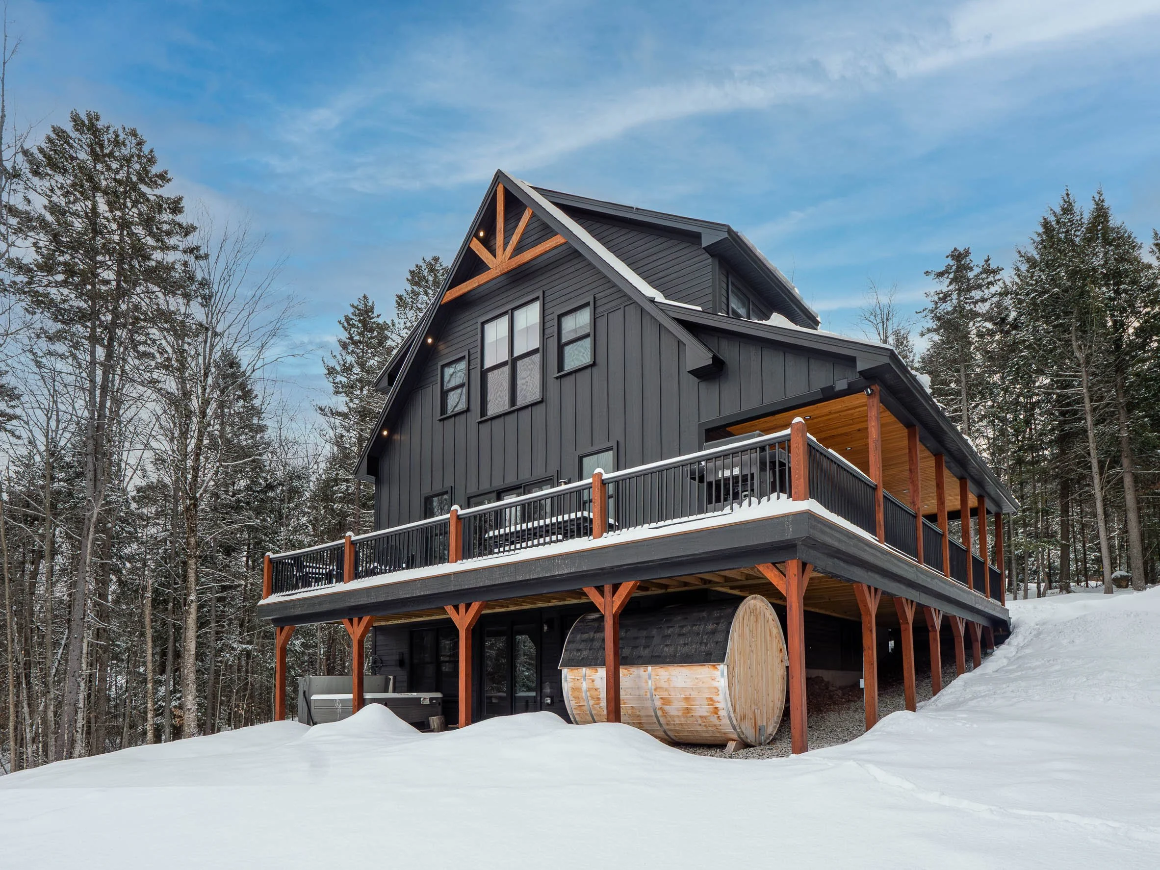 skyline-lodge-43-winter-exterior-sauna-visit-sunday-river.jpg