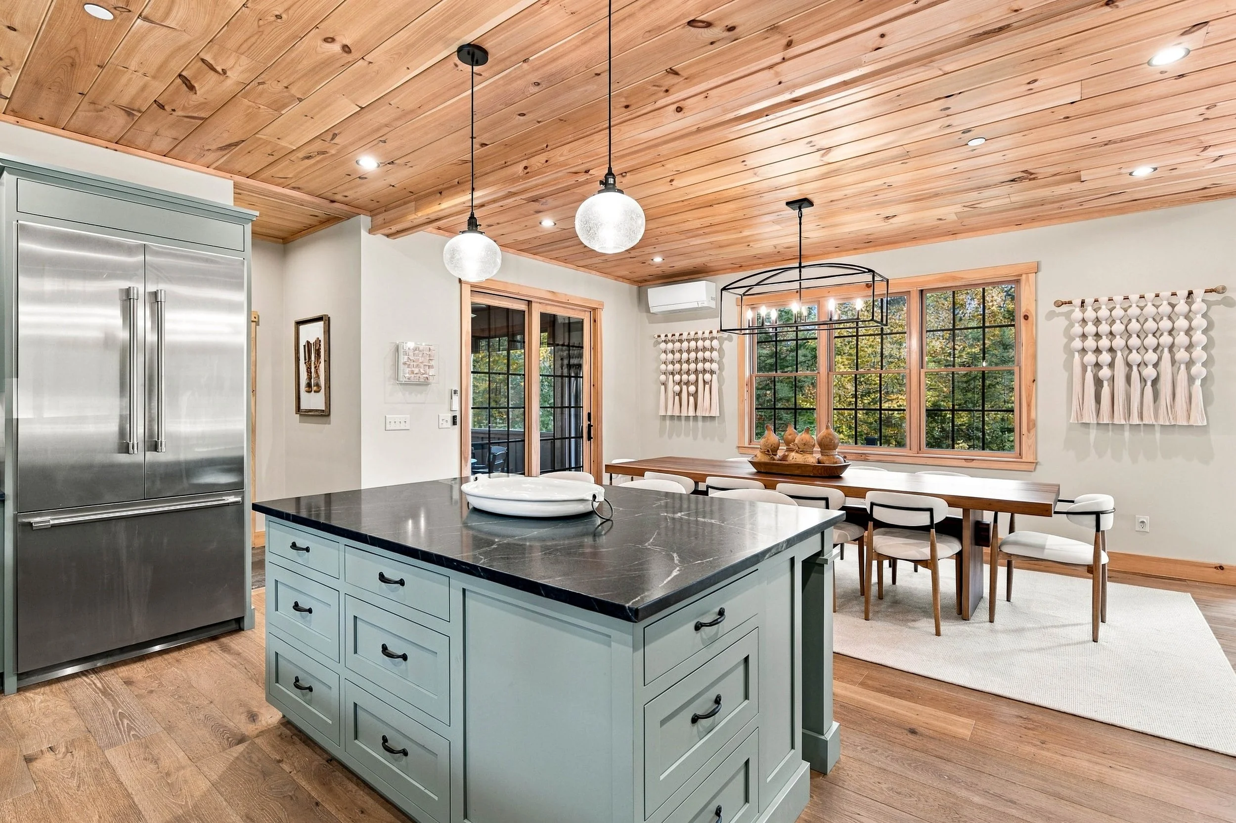 An open-concept kitchen and dining area keeps everyone connected, whether preparing breakfast or hosting a group dinner. 