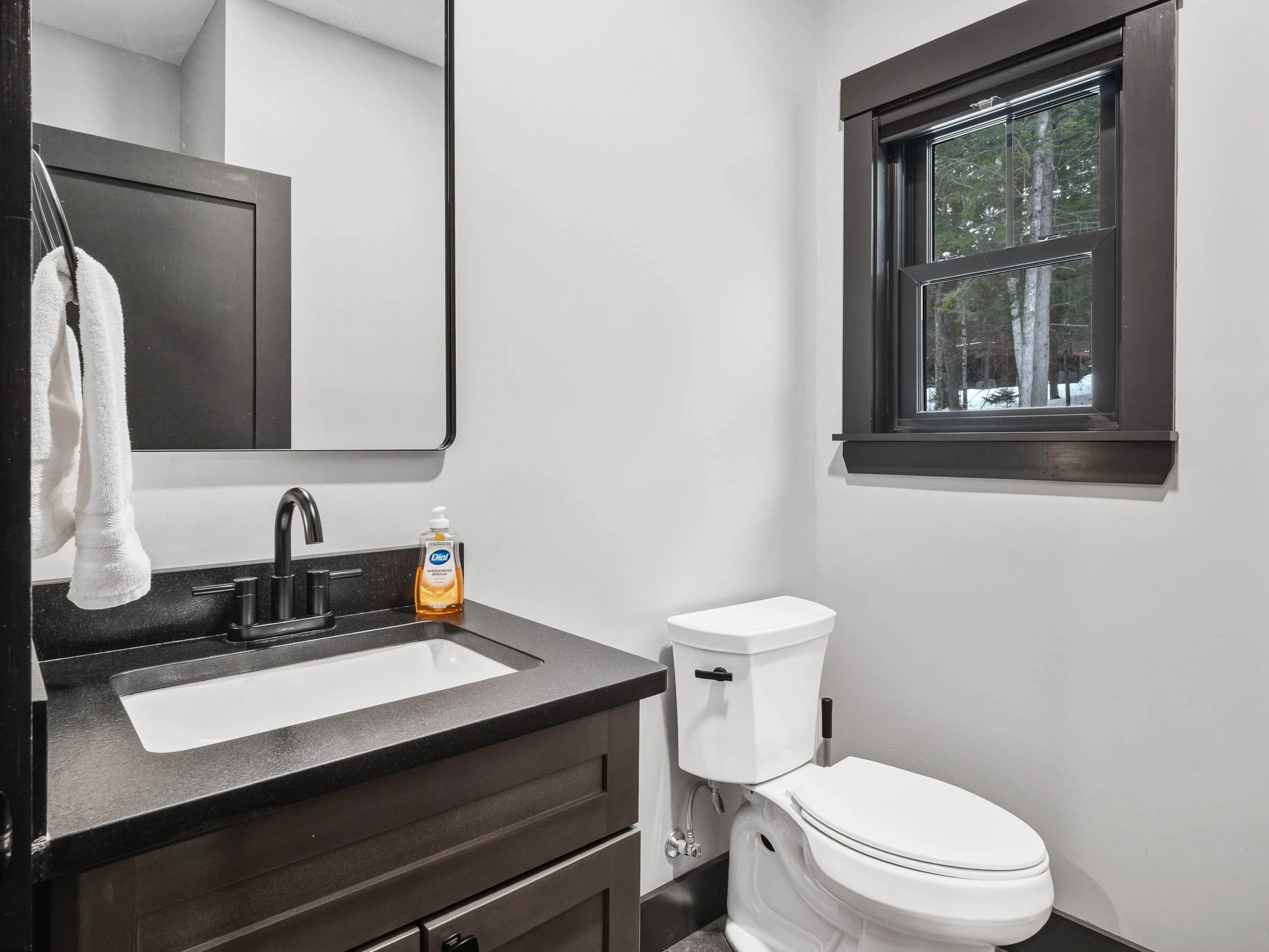 skyline-lodge-54-main-floor-half-bathroom-visit-sunday-river.jpg