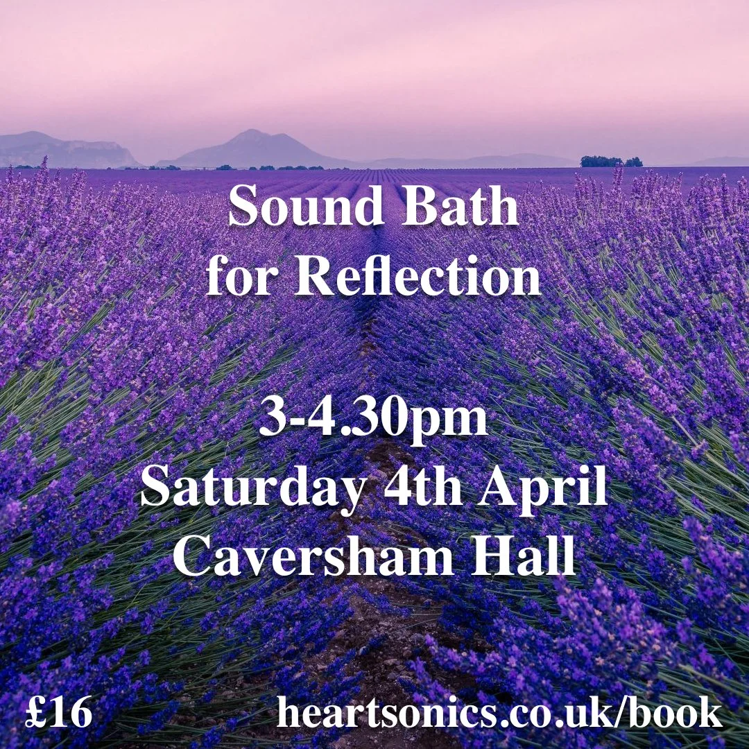 A metallic object with an intricate geometric pattern resembling the Flower of Life, resting on a richly embroidered pink and gold fabric with dragon motifs and gold embroidery details.