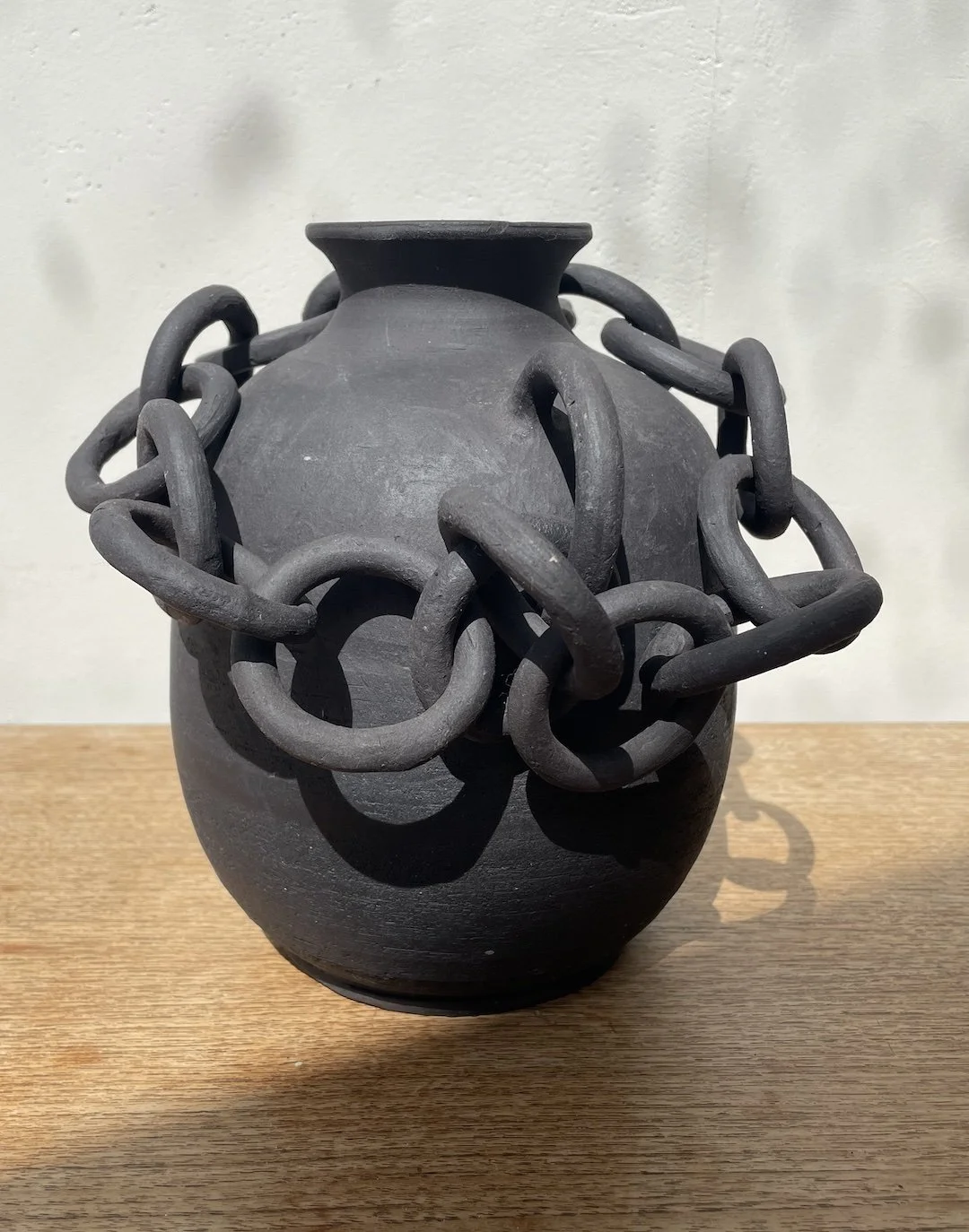 large black chain link vase