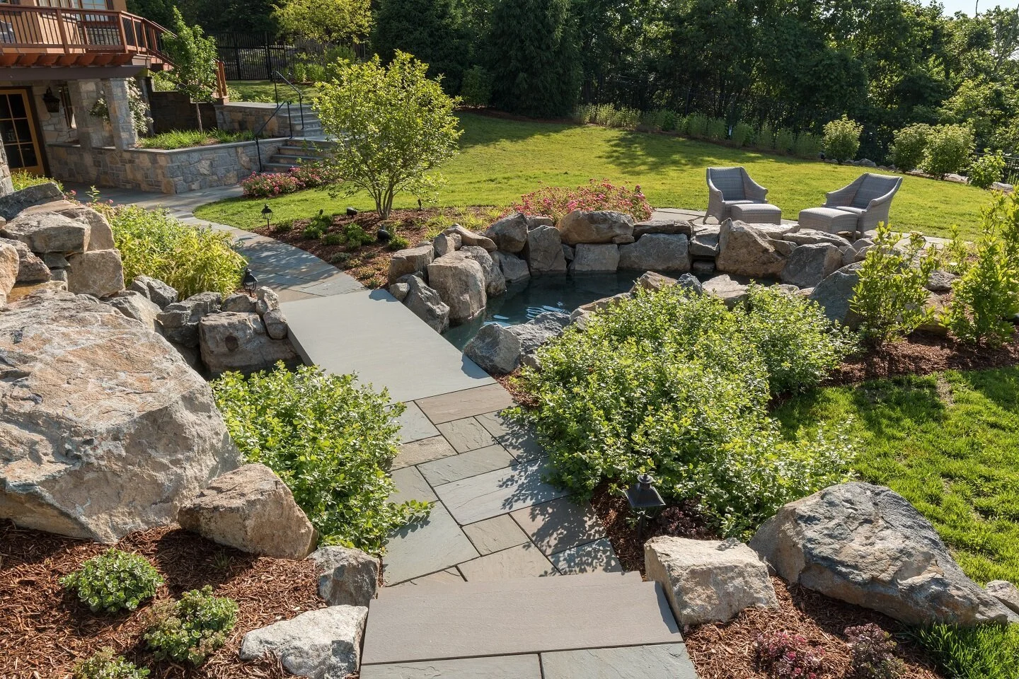 Landscape design in Denville, New Jersey with paver walkway