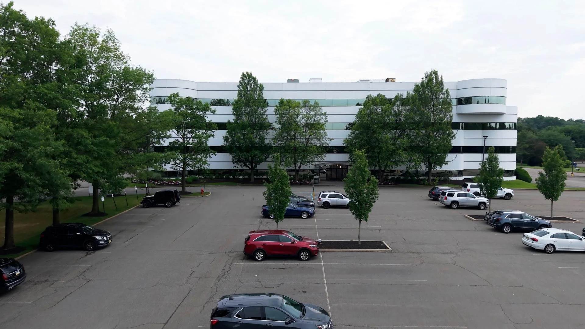 Commercial property transformation showcasing landscaping and snow services in New Jersey