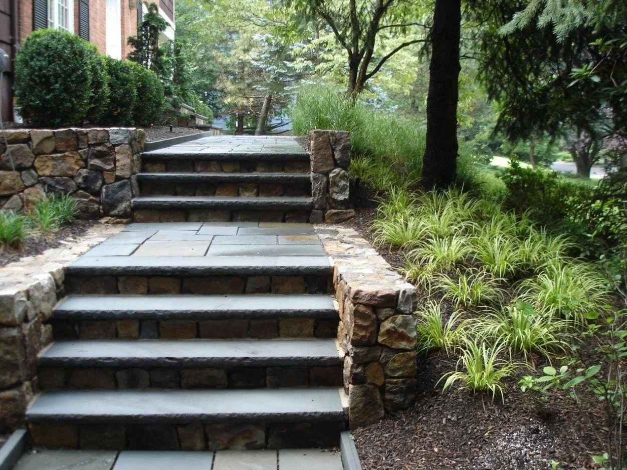 Backyard retaining wall built with natural stone in Randolph, NJ