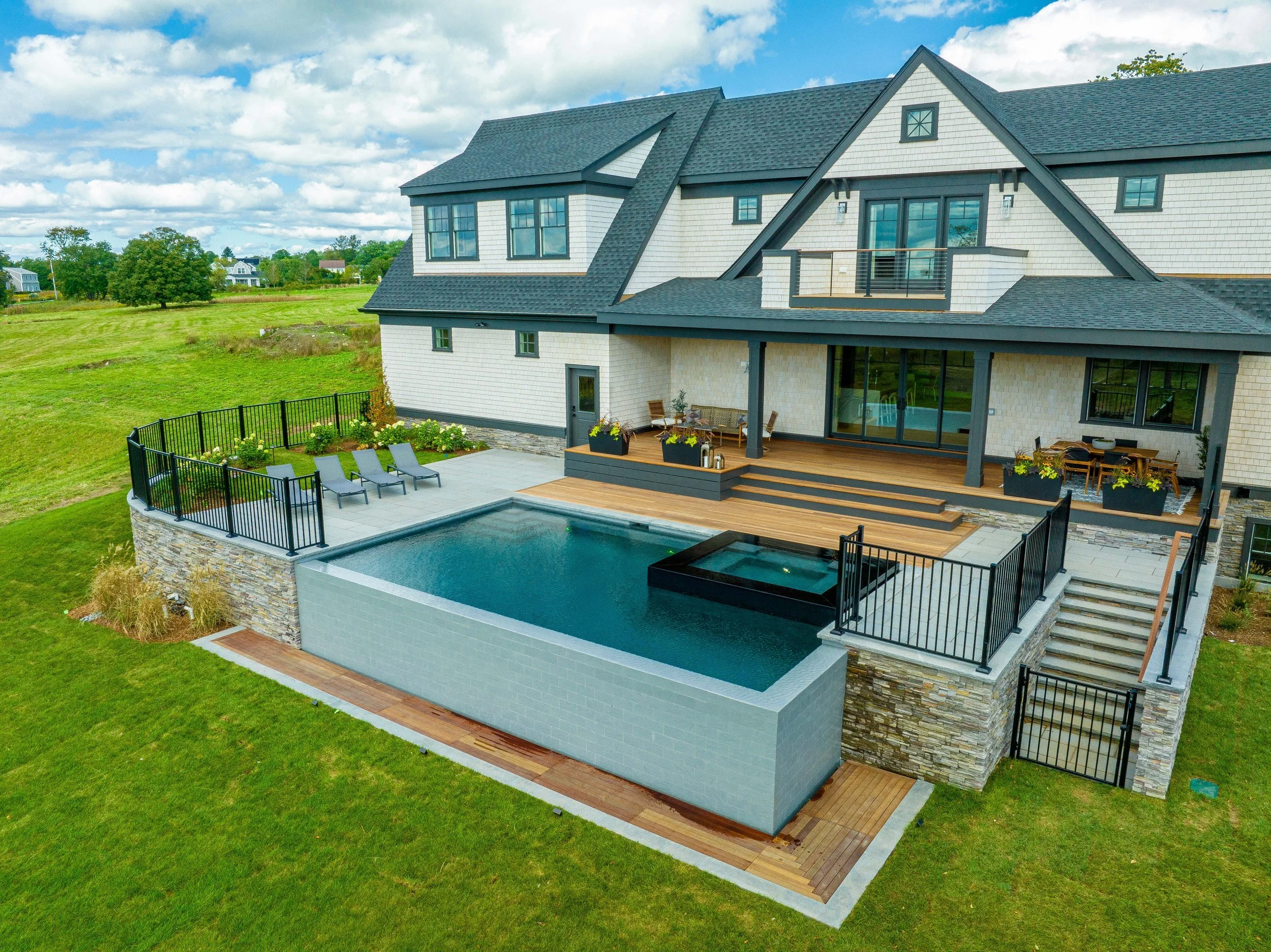 Outdoor living in Wellesley, MA planned for everyday use and seasonal enjoyment