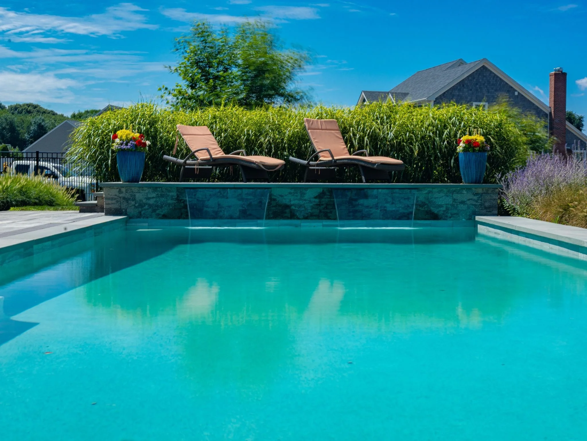 A Look at the Steps Landscaping Companies in the Bristol, RI Area Take to Install a New Backyard Pool