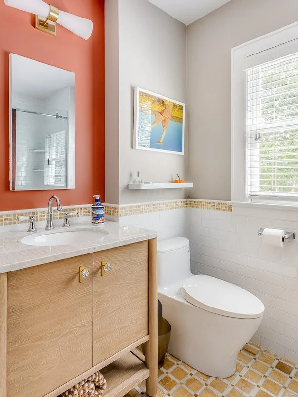 Happy Friday! Time to share another Before &amp; After. Swipe to see the facelift of a kids&rsquo; bath. Keeping the (costly&hellip;) natural stone tiles we added a modern vanity &amp; sconce- @westelm - a bright accent color and fun artwork -  @mint