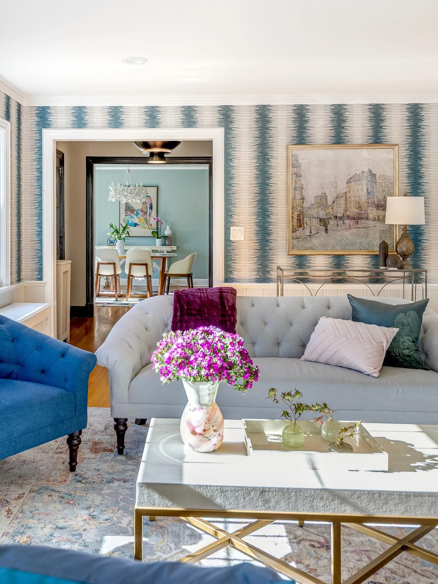 Happy Monday! Sharing the photo of a fun joint-venture we finished last fall. Our clients had already decorated their living room around a beautiful wallpaper. We just added a few art pieces, pillows &amp; accessories to pull together the living room