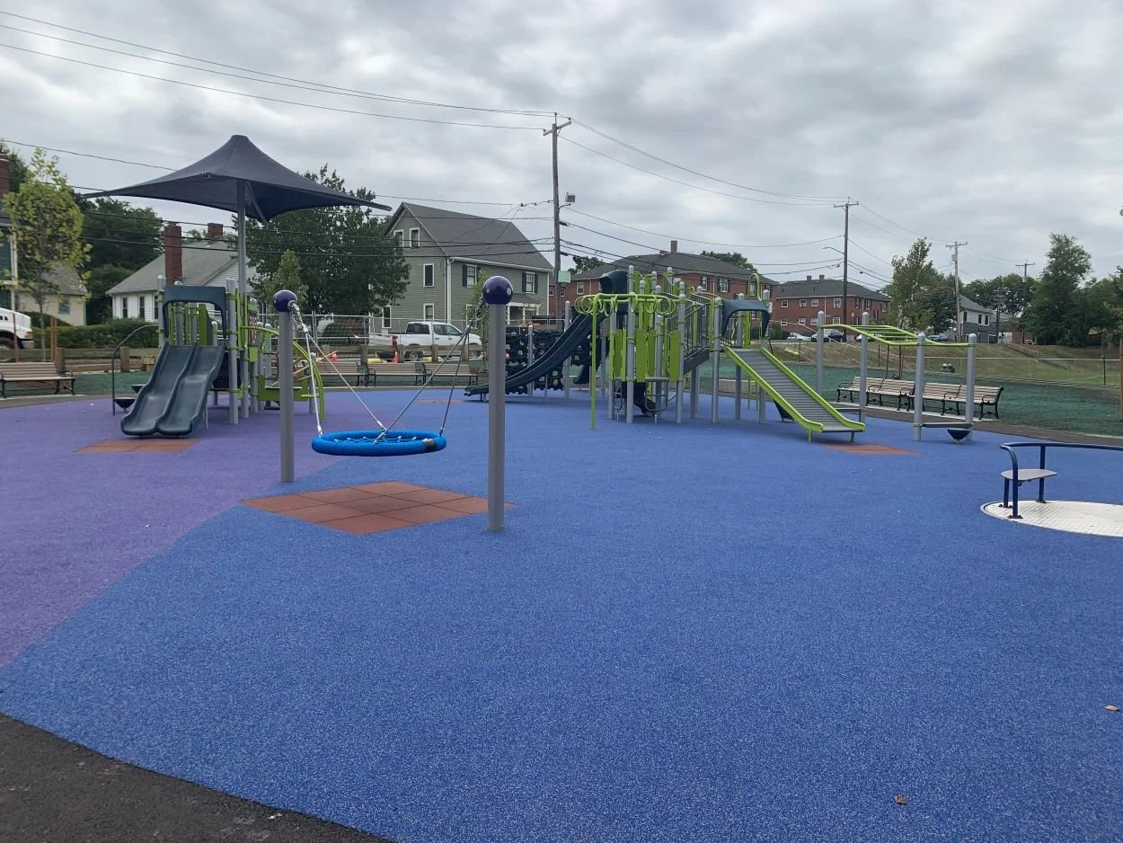 A view of the slides and playground equipment that has been installed by JAM Corporation as a Municipal project for Arlington, MA