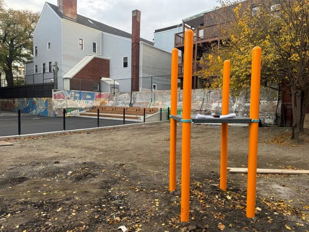 Boston Public School playground before the completion of the renovation project, showing the site before it was renovated by JAM Corporation.