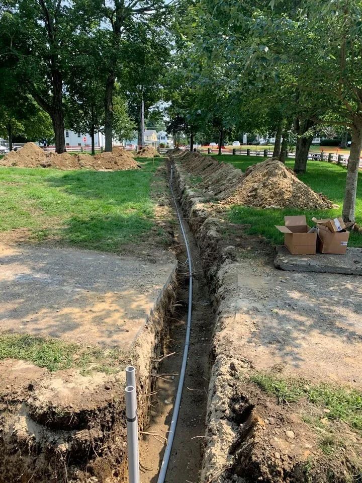 A utilities trench has been dug and utility wires run through it for the Grafton Commons municipal renovation project.