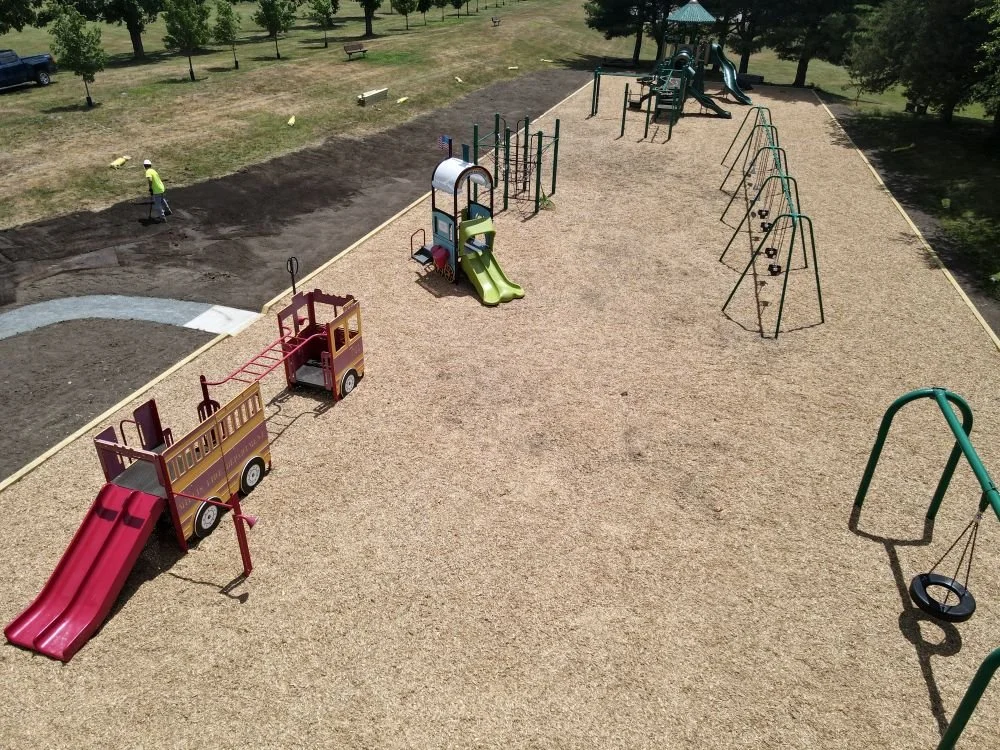 The completed Millis Oak Grove playground with slides and other playground equipment.
