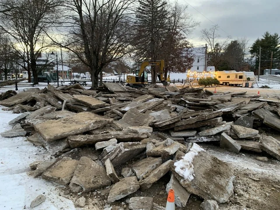 Townsend Common on a winter day as demolition is underway, removing the old walkway in preparation for a new walkway to be installed.