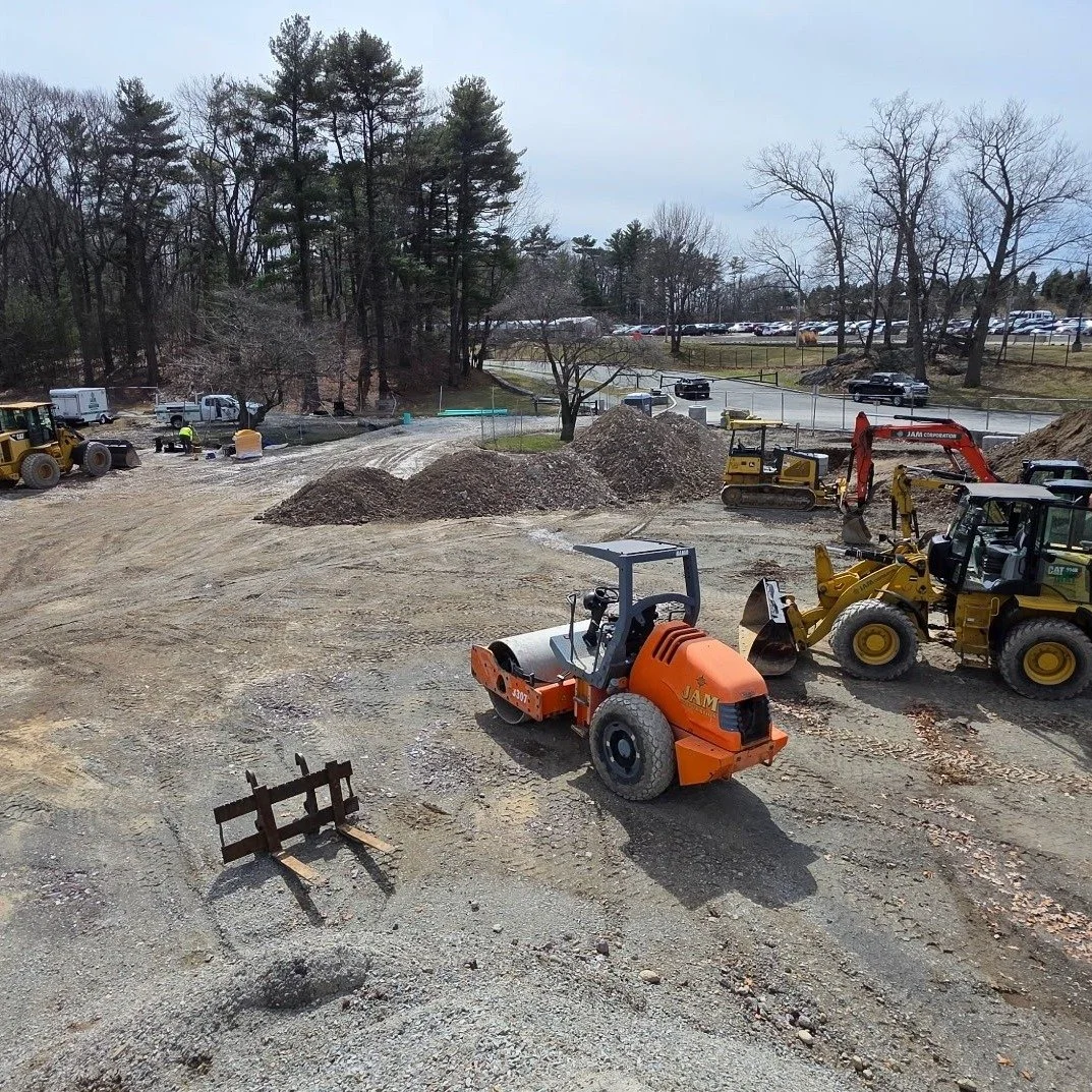 Drainage installation underway in Franklin Park, Boston, as crews return to work.