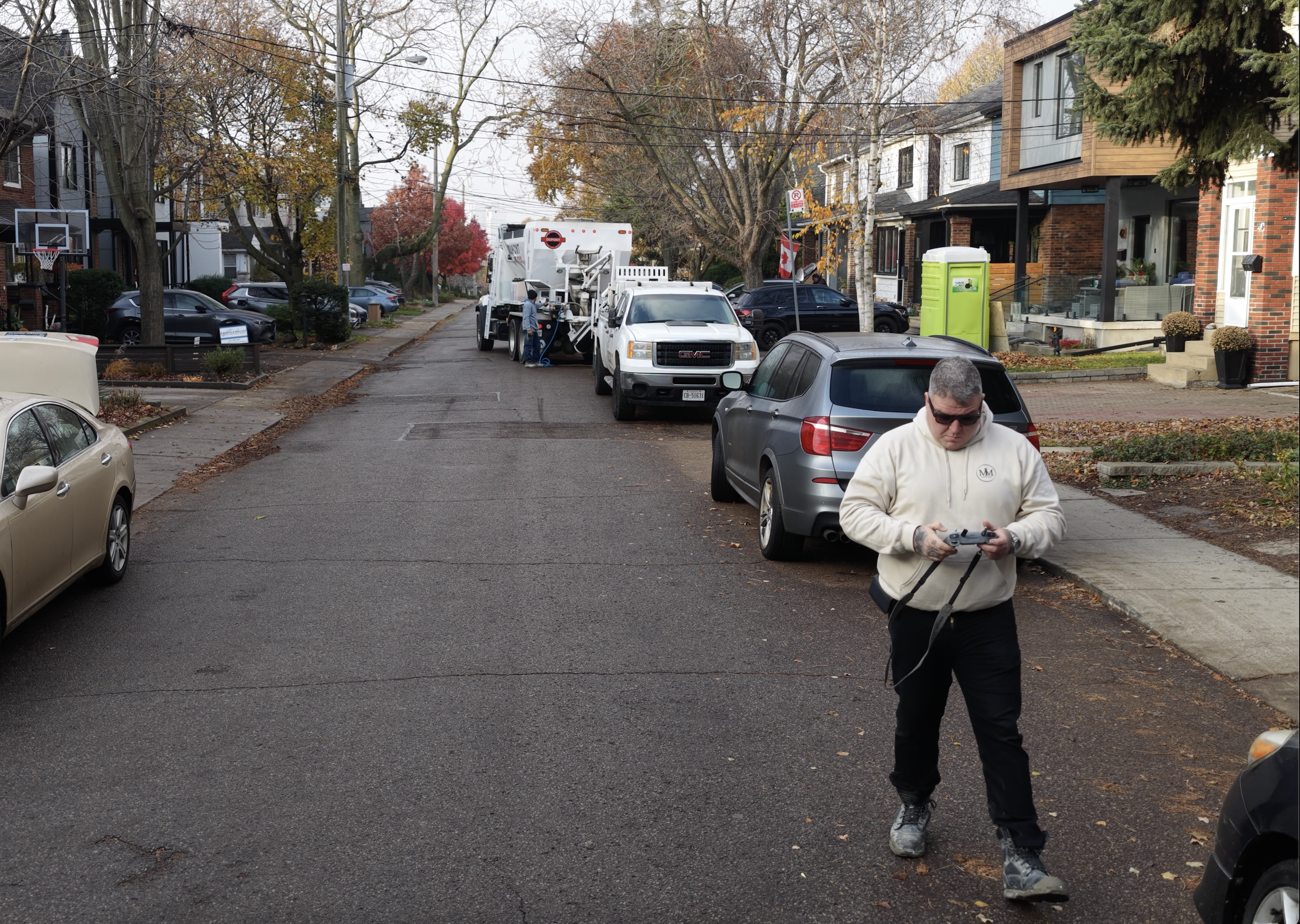 toronto content creator creating a video with a mavic 4 pro during a concrete pour construction project