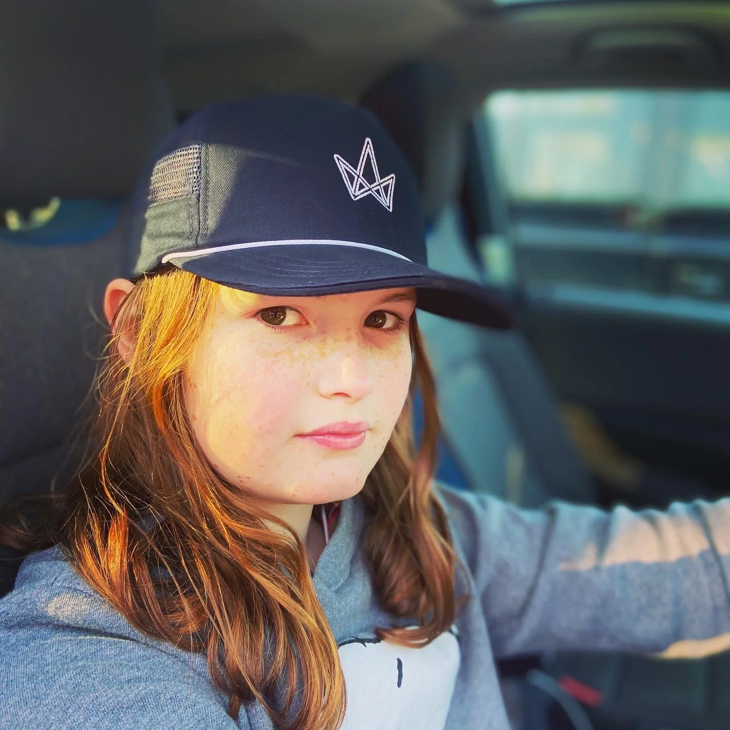Carter in one of Jay's Caps
