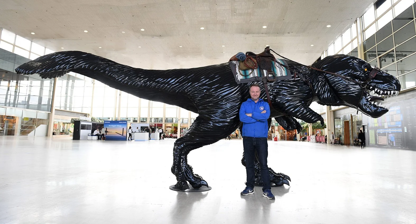 Jay Burridge and his Tyrant Dinosaur sculpture